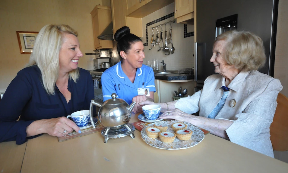 Sam Hackett, CEO of HMS Care and HMS homecare supervisor Lisa Pattison with HMS's first client Christine Croudace