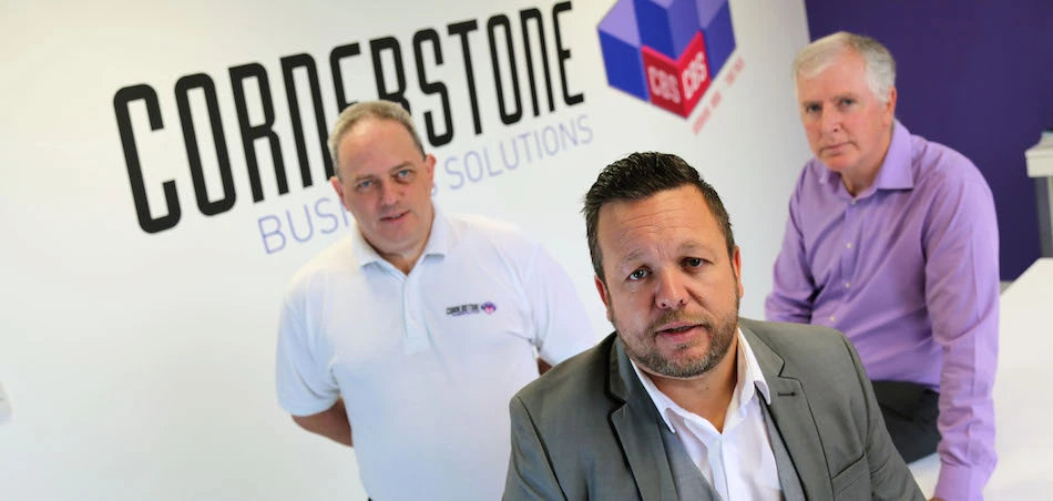 Cornerstone Business Solutions managing director Chris Petty (centre) with fellow directors Chris Clark (right) and John Storey.