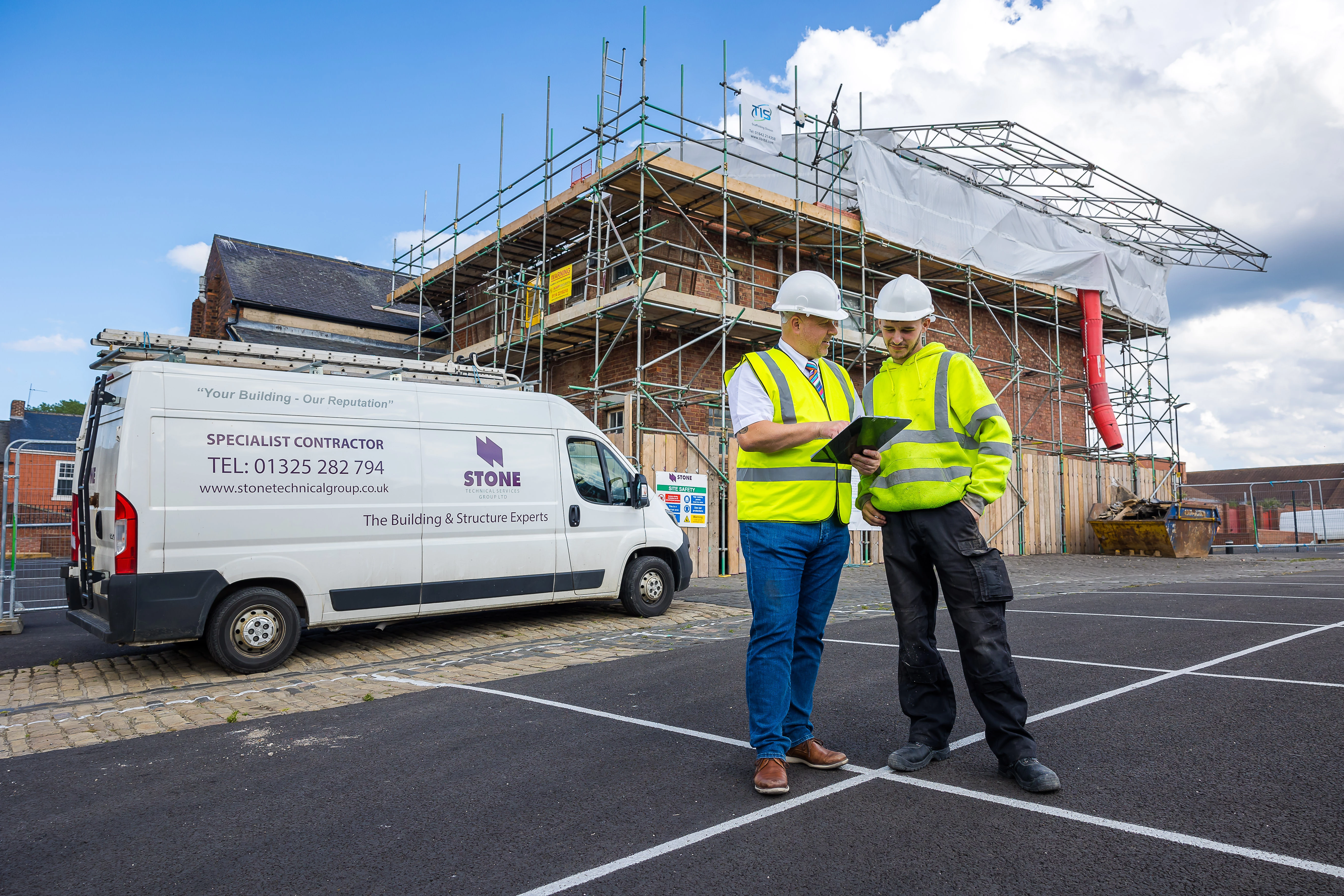 Richard Pavlou, MD at Stone Technical Services Group and Ben Hudson, Level 1 extended construction student.