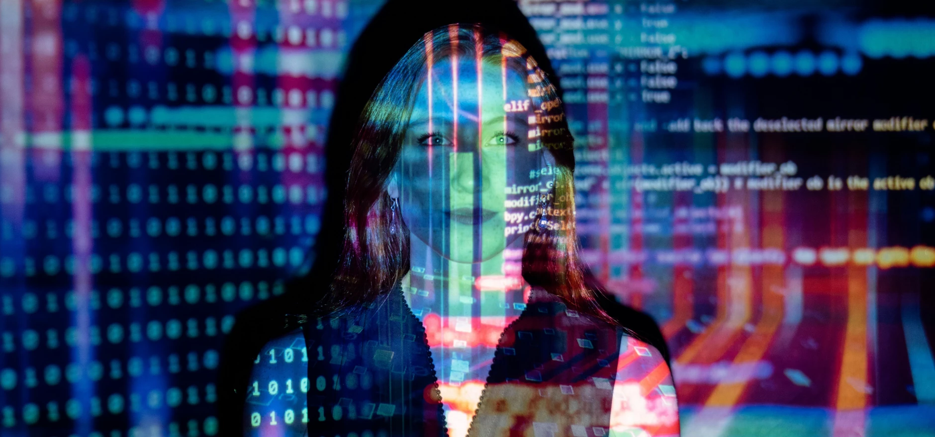 A woman with digital code projections on her face, representing technology and future concepts.
