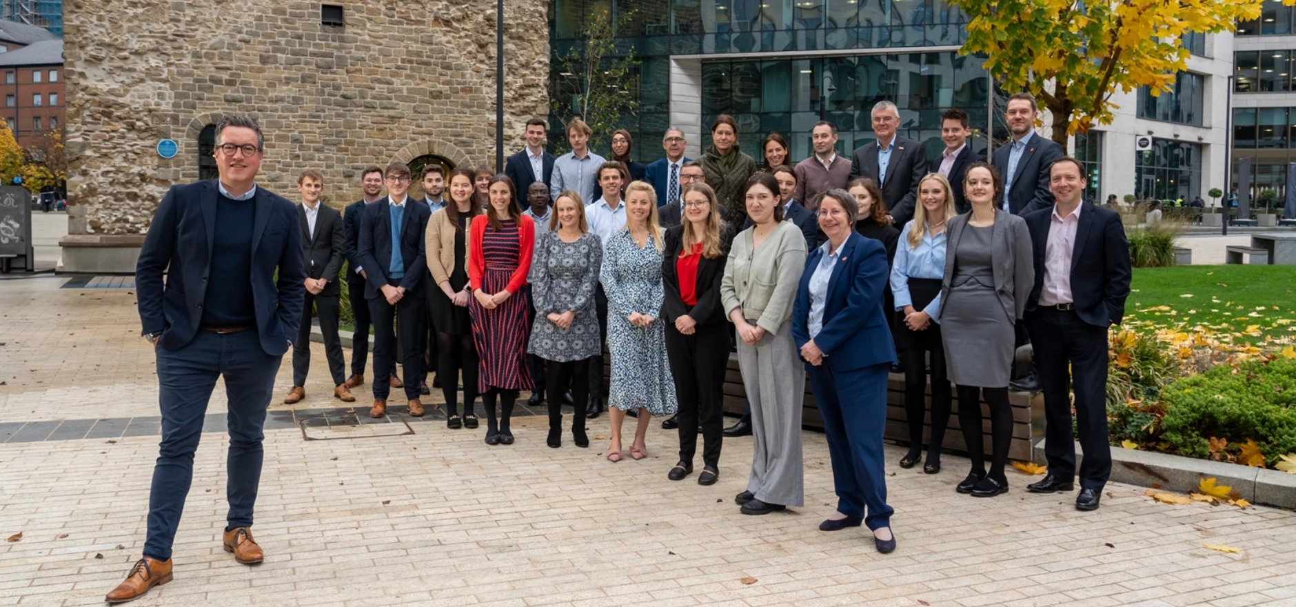 Jonathan Davis, partner and head of Saffery’s Yorkshire office, in front of members of the Yorkshire team.jpg