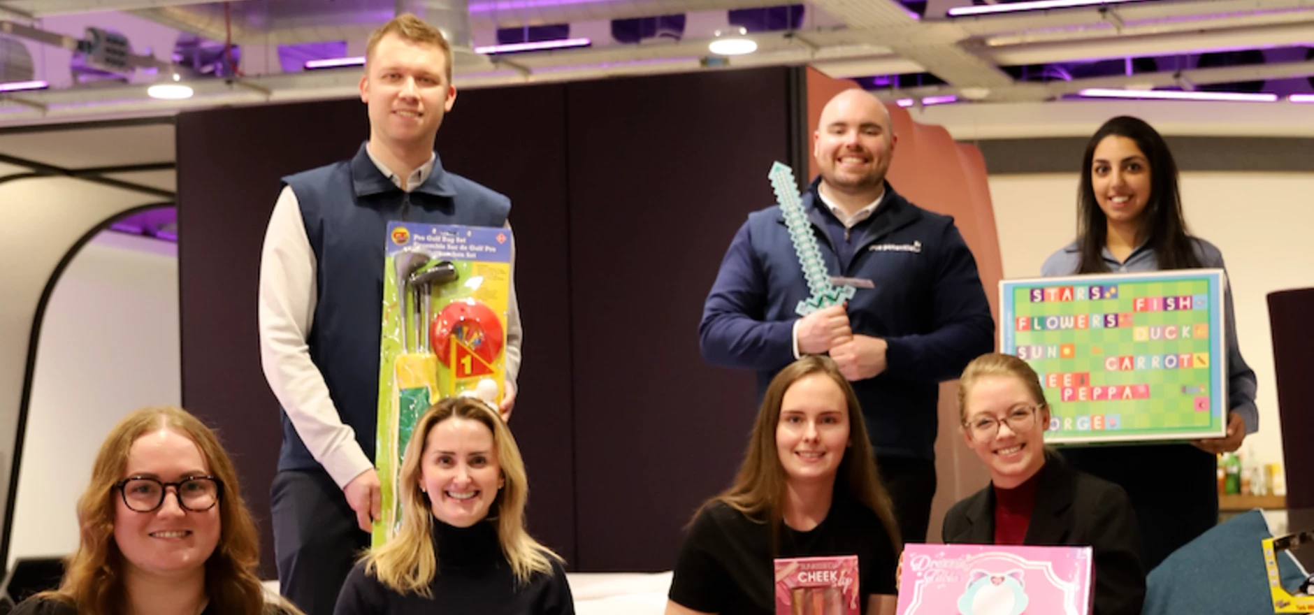 Esther Heale, Group Executive Assistant at True Potential (second from left) with members of the team. The company has raised over £50,000 for Mission Christmas to date.