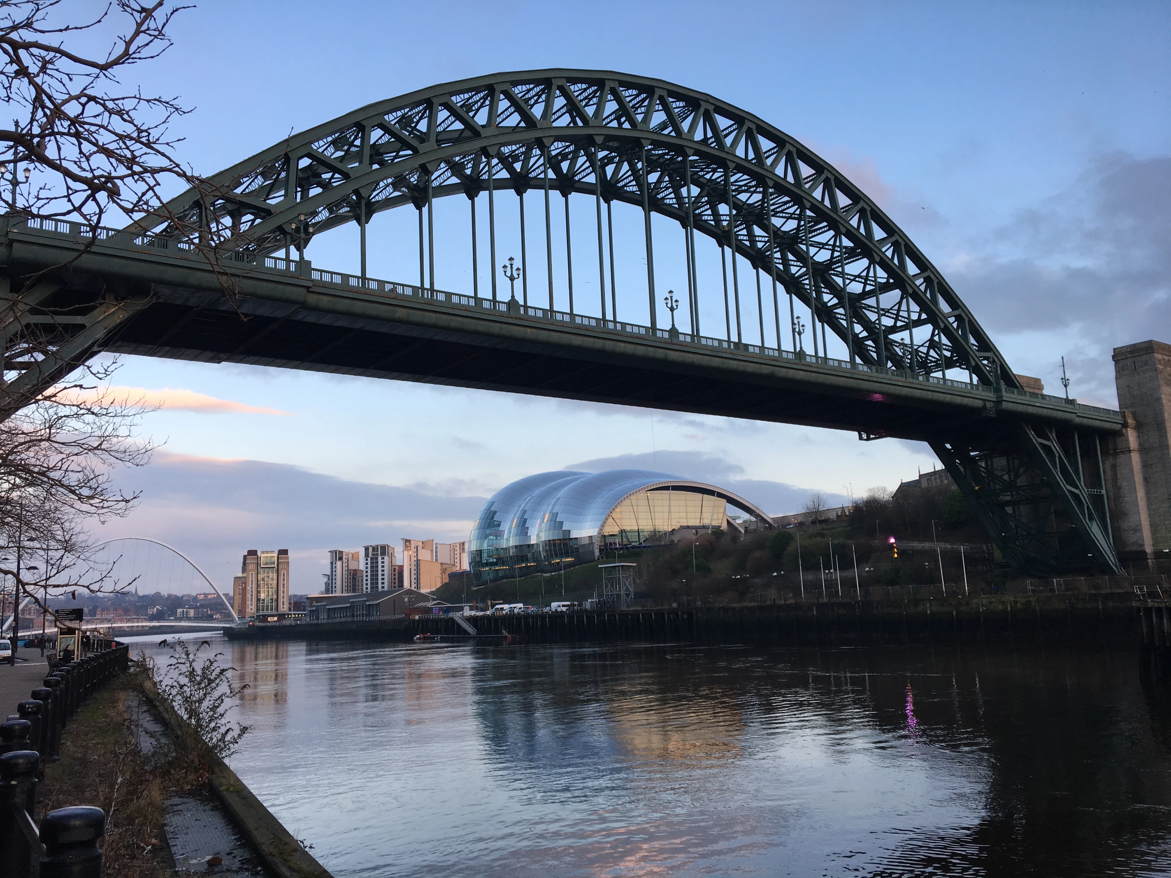 River Tyne, Newcastle-upon-Tyne. Looking downriver; in the foreground the Tyne Bridge, in the background the Sage Centre