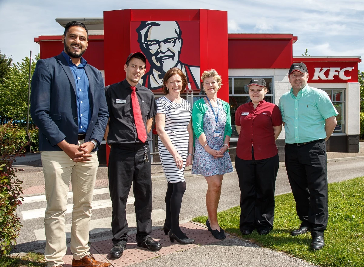 L-R Muddassir Shah employability support coordinator, Phil Burt restaurant manager at KFC Portway, Pauline Hughes, Tracey Jones hospitality assessor, new recruit Siobhan Palmer and Gary Mather