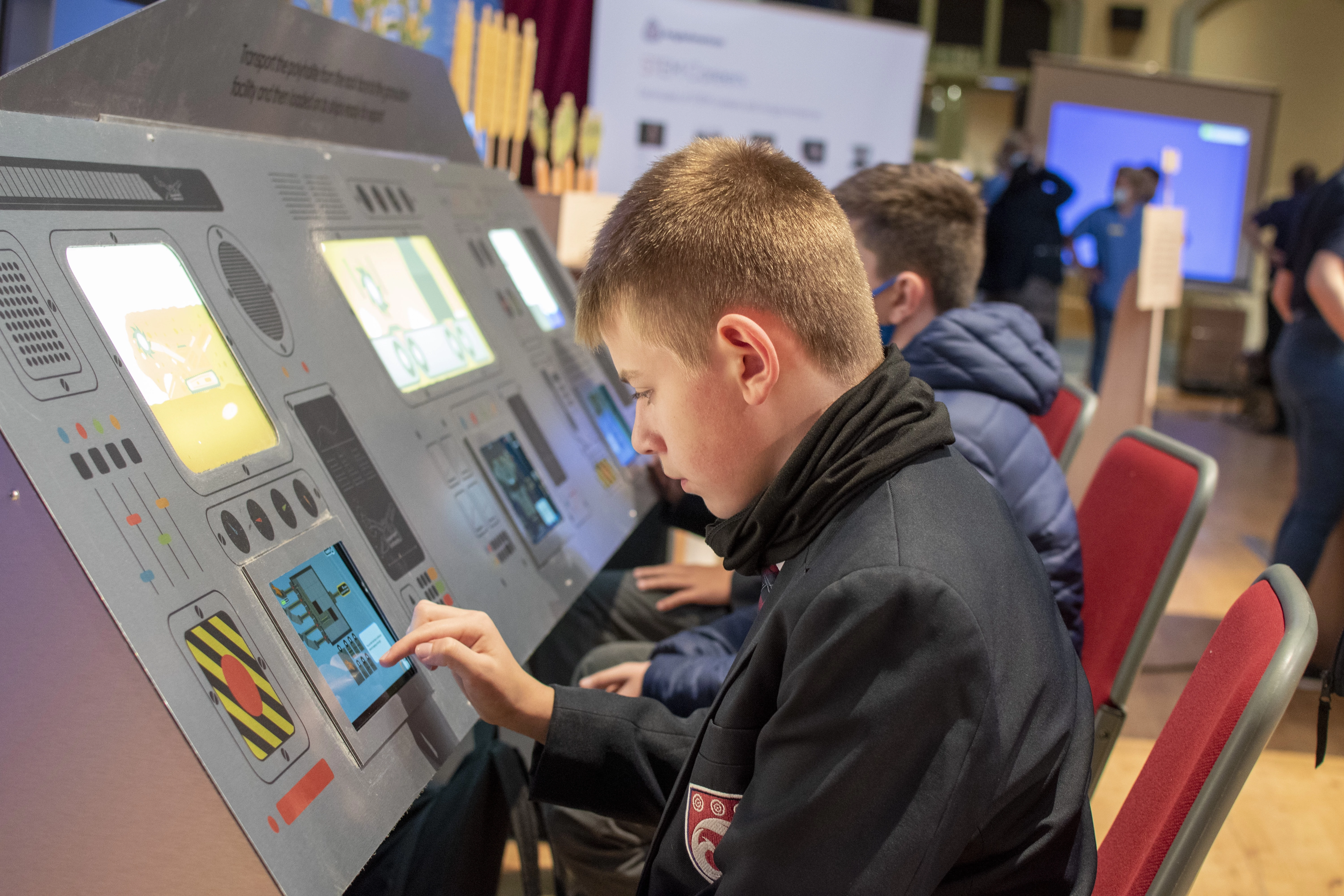 Students play the interactive games at Anglo American’s stand during Scarborough Science and Engineering Week
