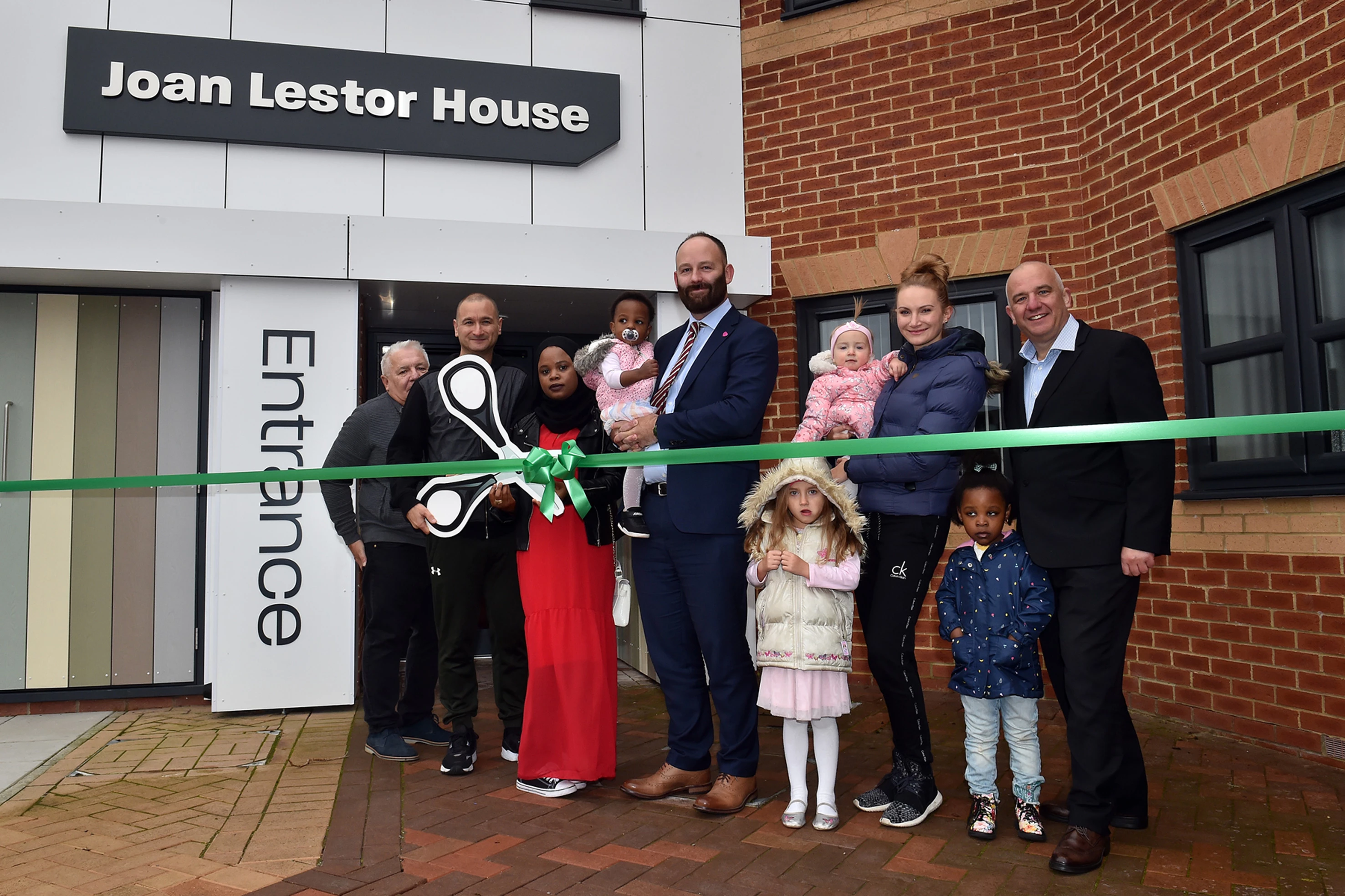 Mayor of Salford Paul Dennett and Salix Homes chief executive Lee Sugden with residents at the launch of the Joan Lestor House development Joan Lestor House has been transformed 