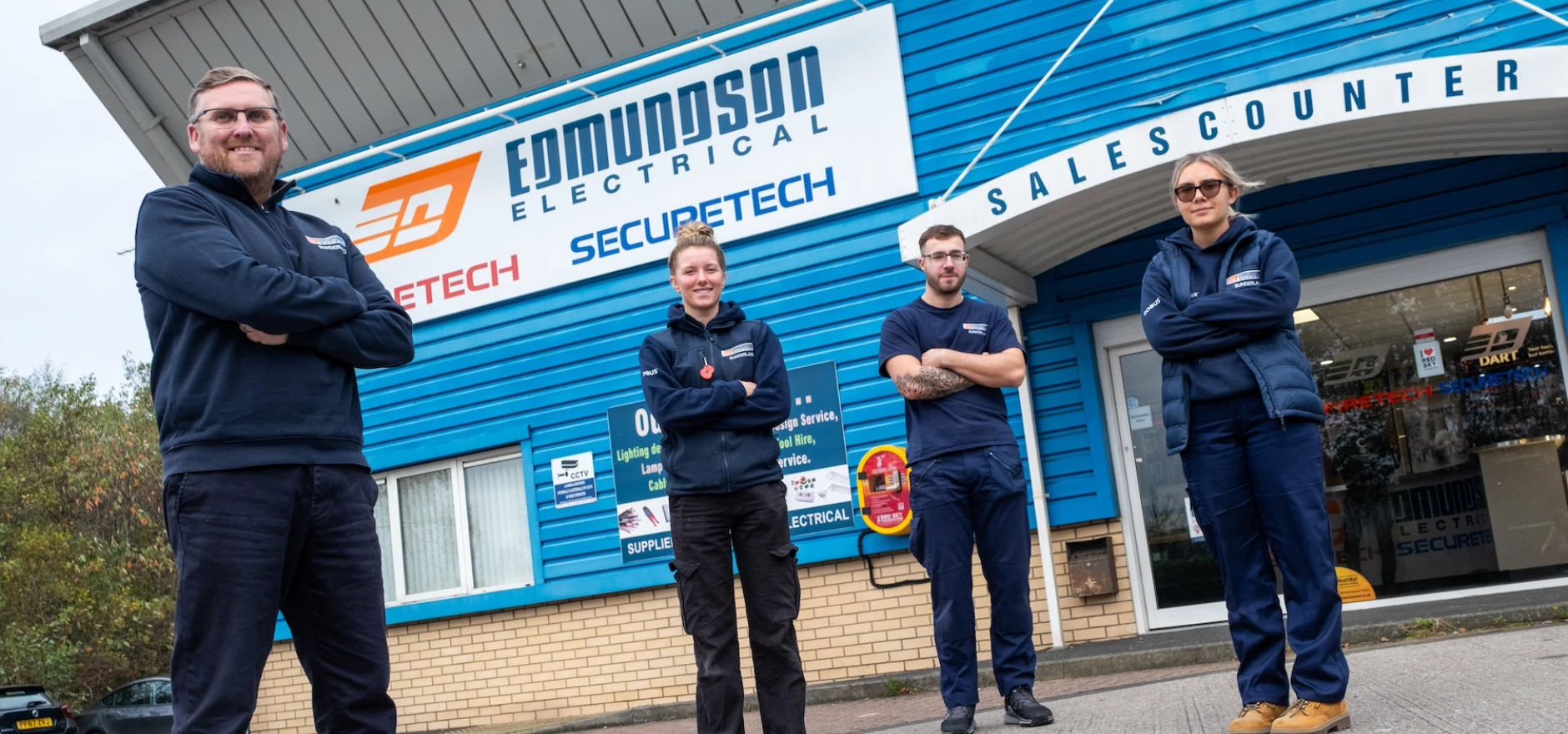 Branch manager Andy O’hair (left) with the new apprentices.jpg
