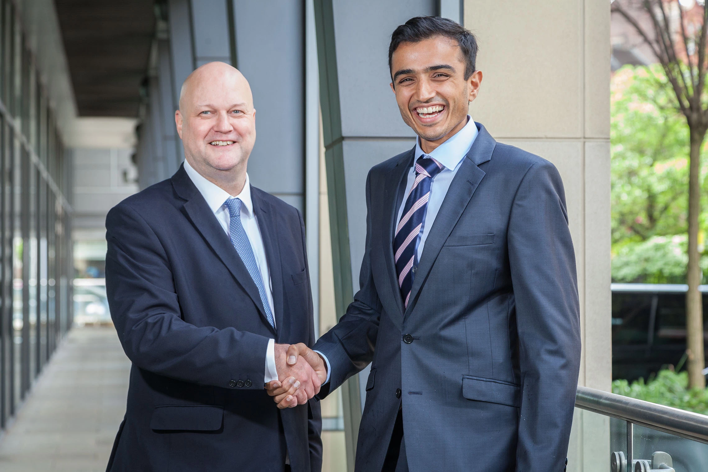 Abbas Khan (right) is welcomed to Taylor&Emmet by head of employment law, Simon Brian. 
