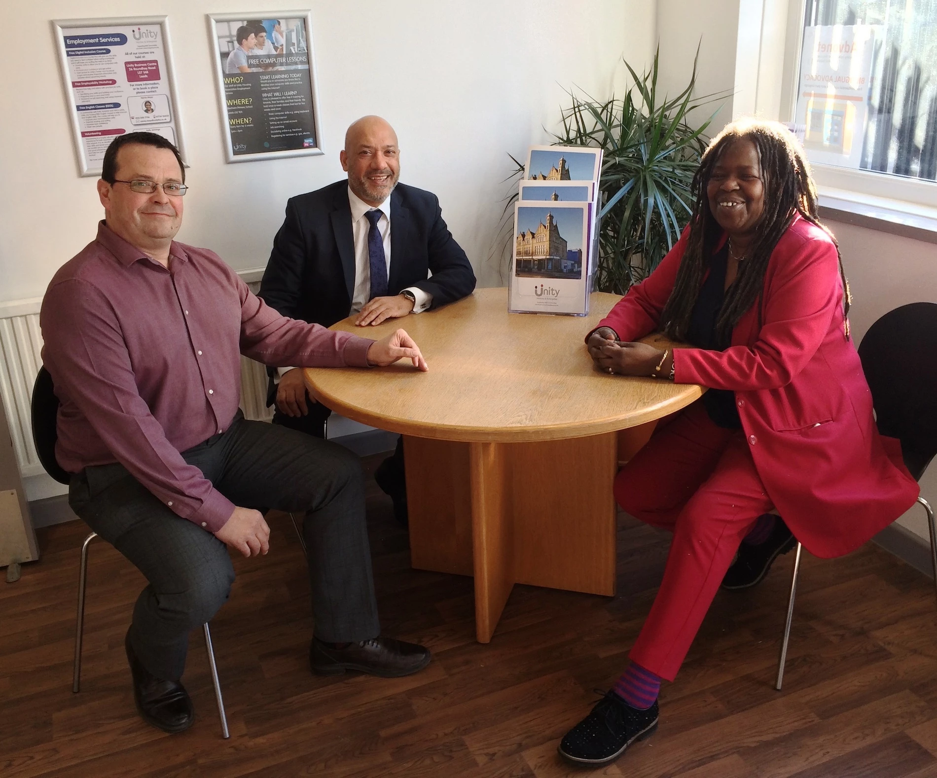Unity Enterprise manager Adrian Green, Unity Homes and Enterprise chief executive Ali Akbor and iota Business founder Cristine Wilson.