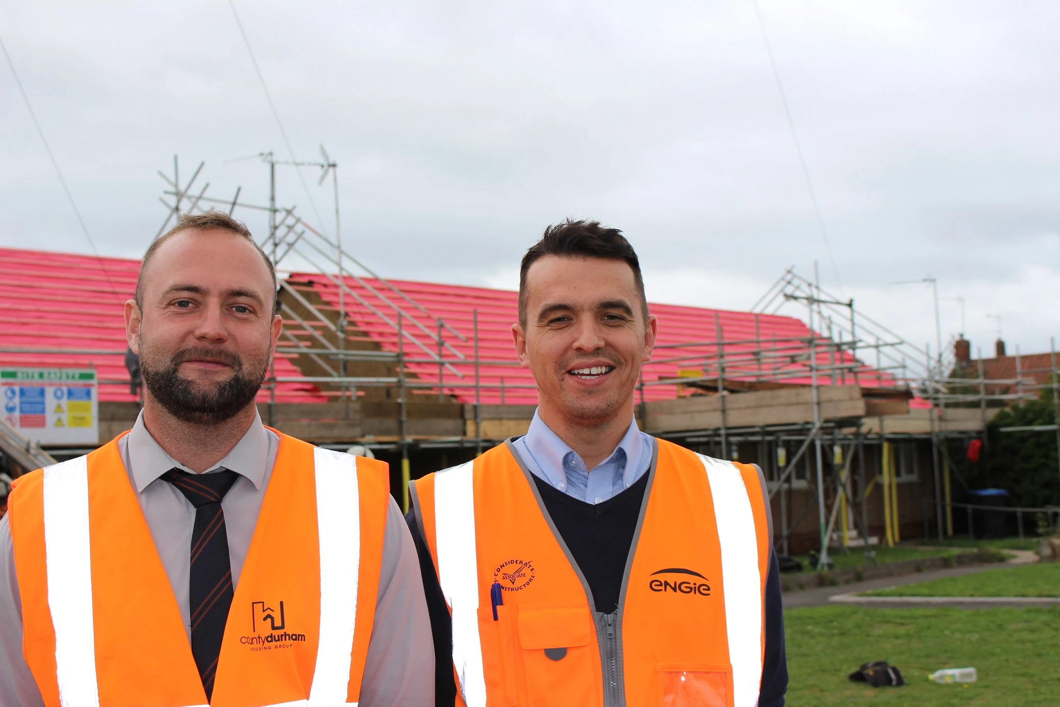 Daryl Reed from County Durham Housing Group and Brian Bedford from Engie in Norwich Gardens, Willington.