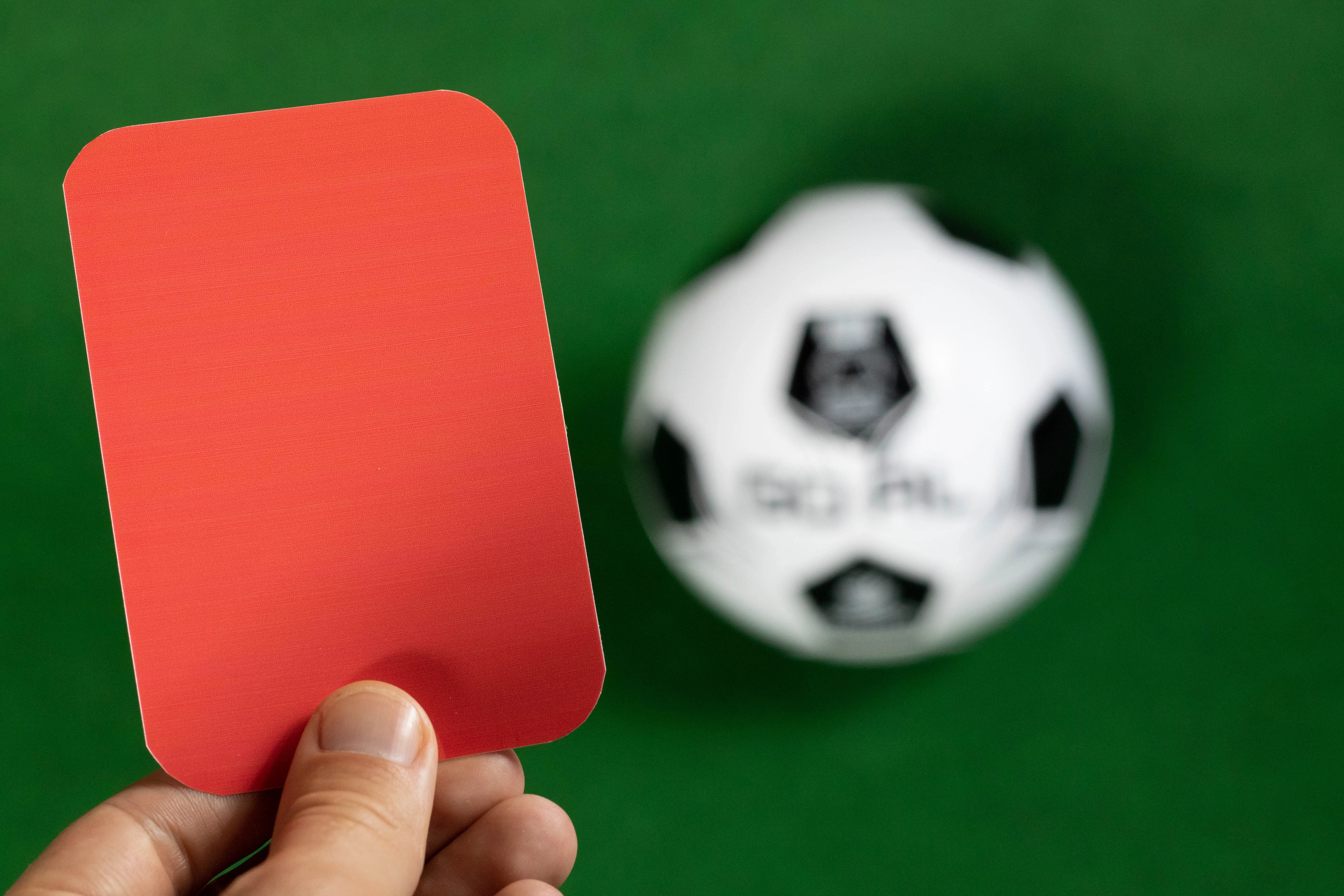 The referee in red card gesture