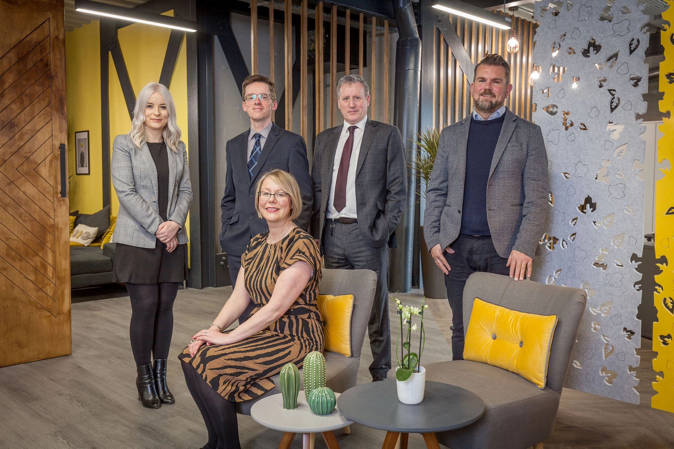 (Left to right): Sophie Kendall of OVO, Taylor&Emmet's Richard Whiteley and Steve Hinshelwood and Ian Appleyard and Heather Slater (sitting) of haus admire the firm's new premises. 
