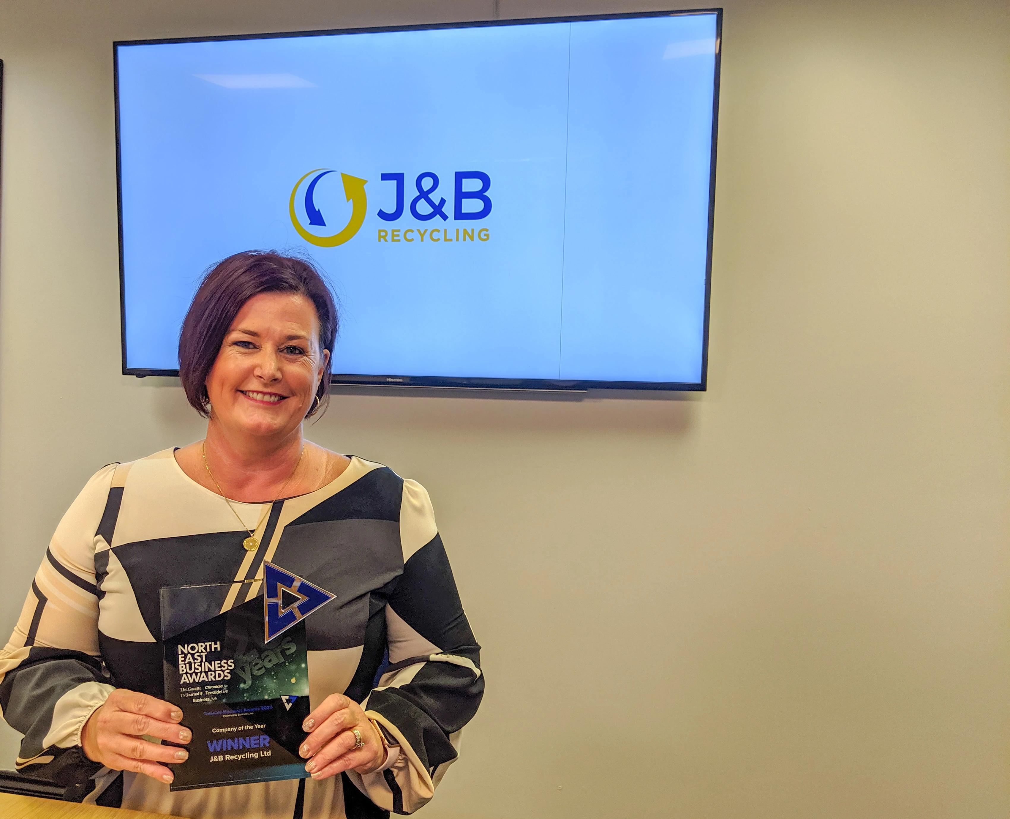J&B Recycling's CEO, Vikki Jackson-Smith, holding the Teesside Company of the Year award.