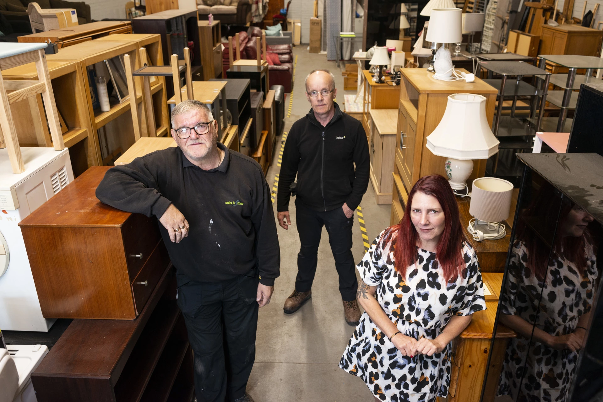 Salix Homes furniture recycling warehouse with staff David Ryan, Brendan Fanning and Janine Hart