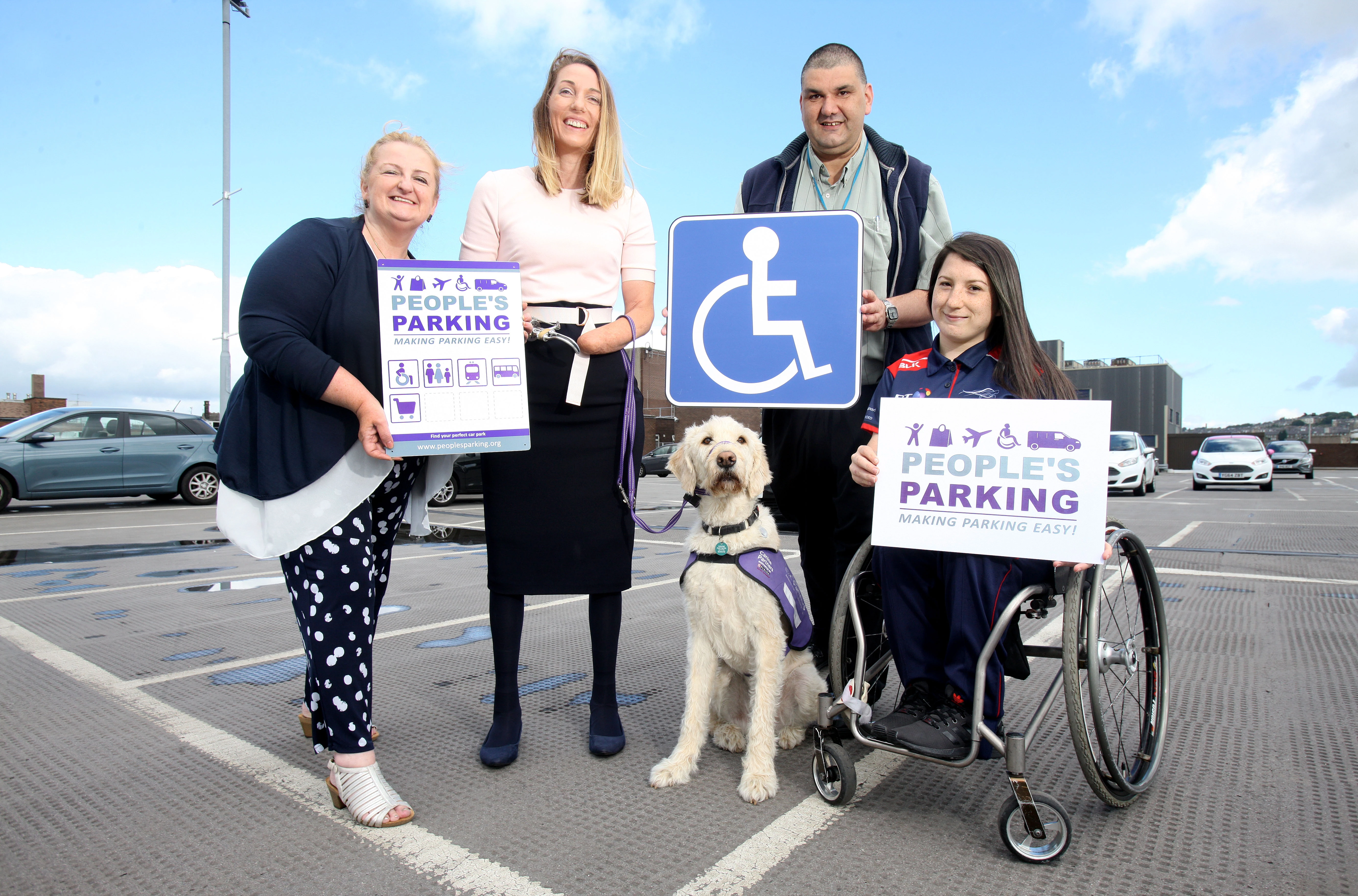 Kirkgate Shopping celebrates People's Parking accreditation (l-r) centre manager Catherine Riley, Helen Dolphin with assistance dog Fairmount, Emmerson Walgrove and Coral Batey