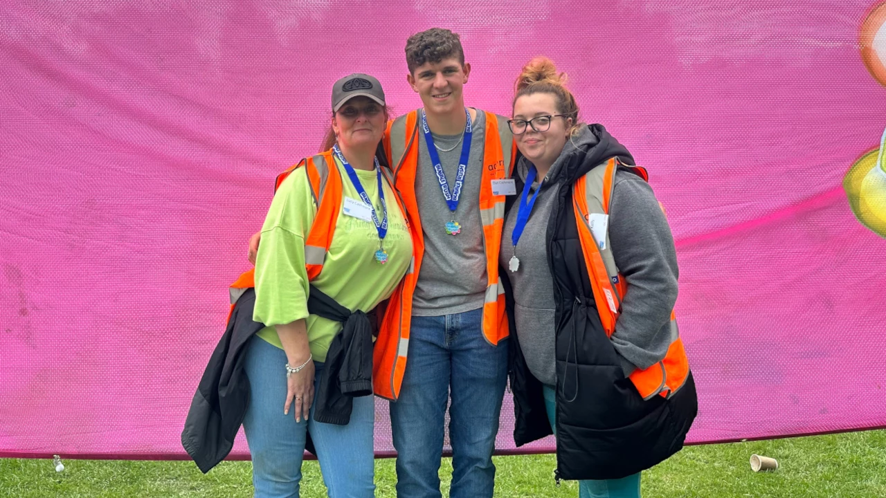 Lucy Cashmore (left), Daniel Cashmore and Becky Kells volunteering at the Acorns Bubble Rush event