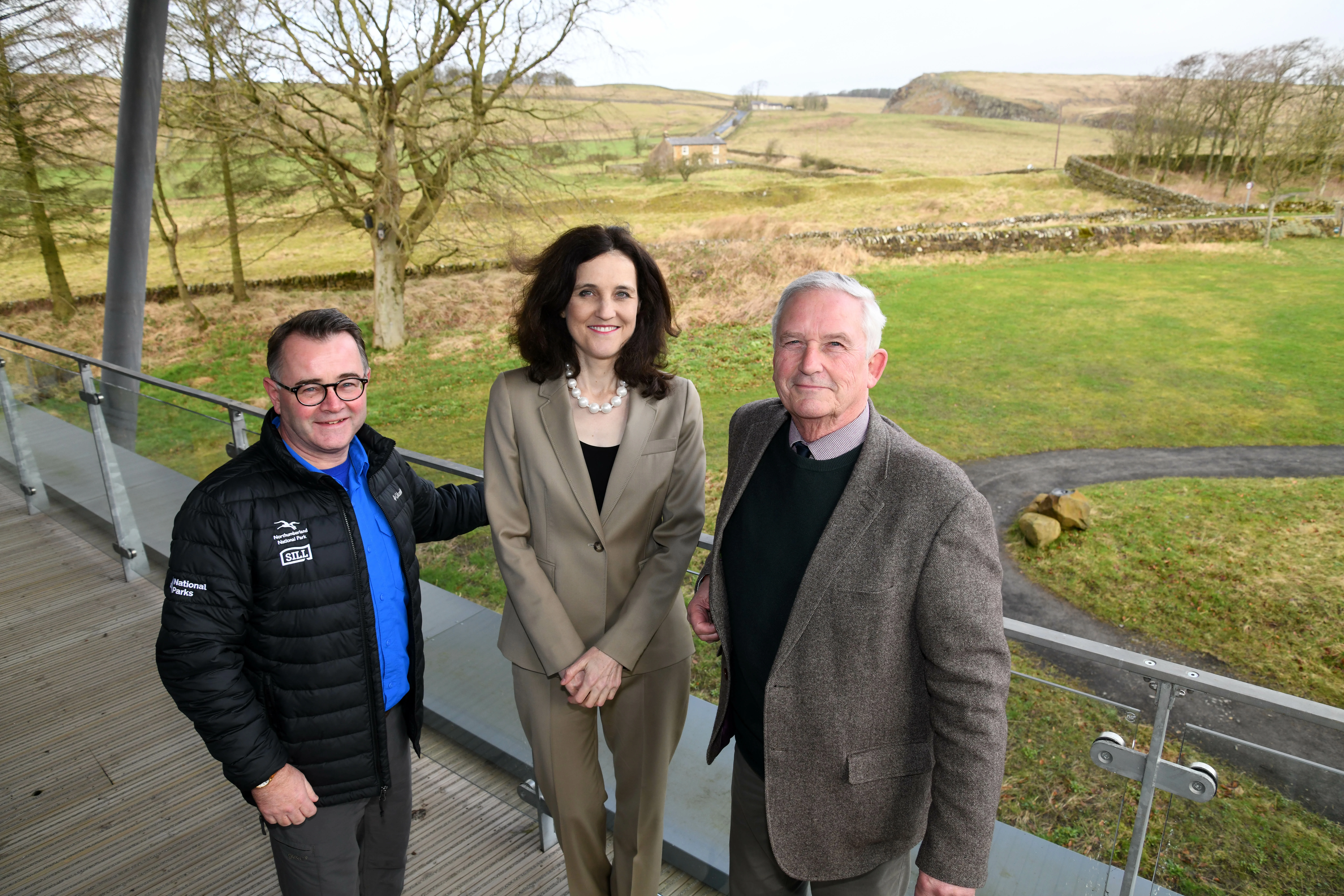 (Left to right) - Tony Gates, Chief Executive of Northumberland National Park, The Right Honourable Theresa Villiers, Secretary of State for Environment, Food, and Rural Affairs and Glen Sanderson, Chairman of Northumberland National Park 