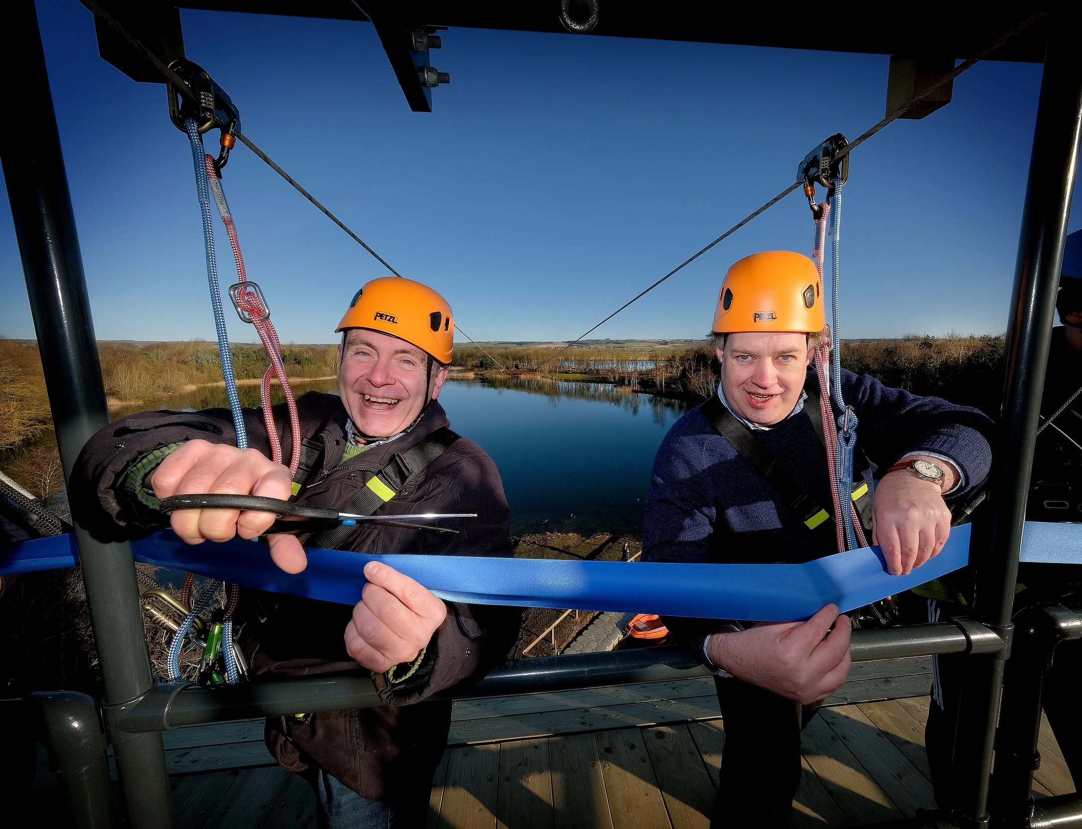 Sir Robert Good Will (left) and Lord Downe of Dawnay Estates (right) officially opening the new zip line at North Yorkshire Water Park.