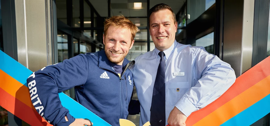 Olympian Jason Kenny (left) as he cuts the ribbon on the new Aldi at Logistics North