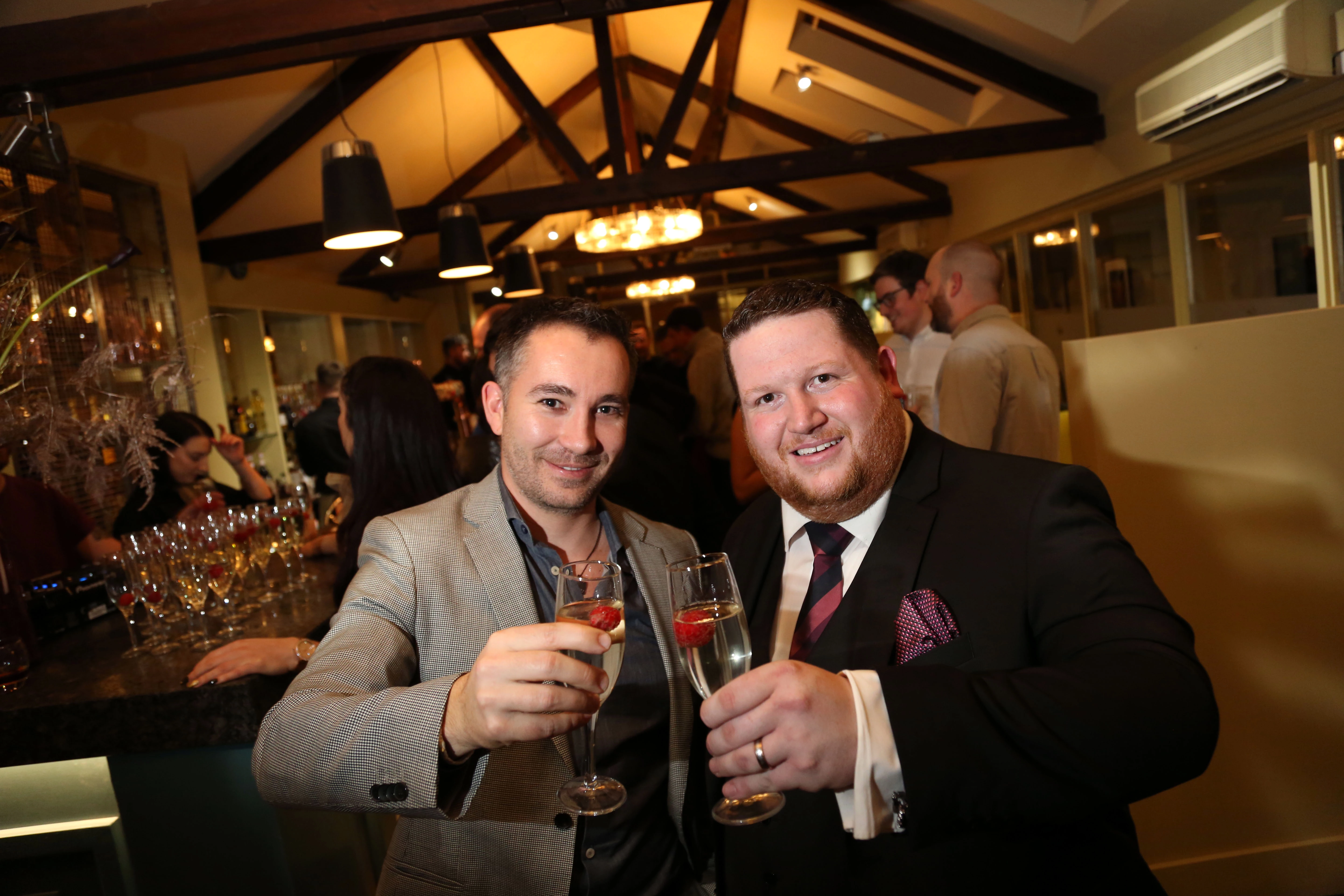 Co-owners James Pennington (left) and Mike Racz celebrate the opening of restaurant and cocktail bar Black Olive on Yarm High Street.