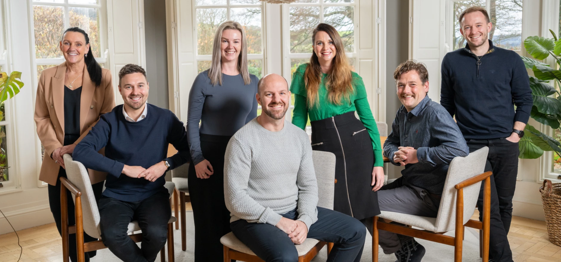Managing director Chris Flanagan, front, centre, with the Chapters team