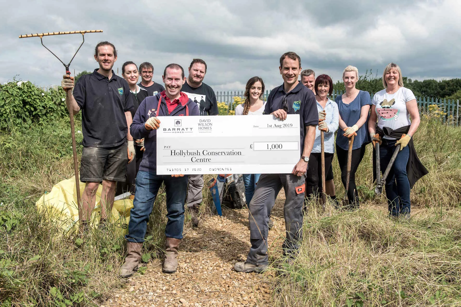 Finance Director, Andy Donoghue and his team with Hollybush Conservation Centre