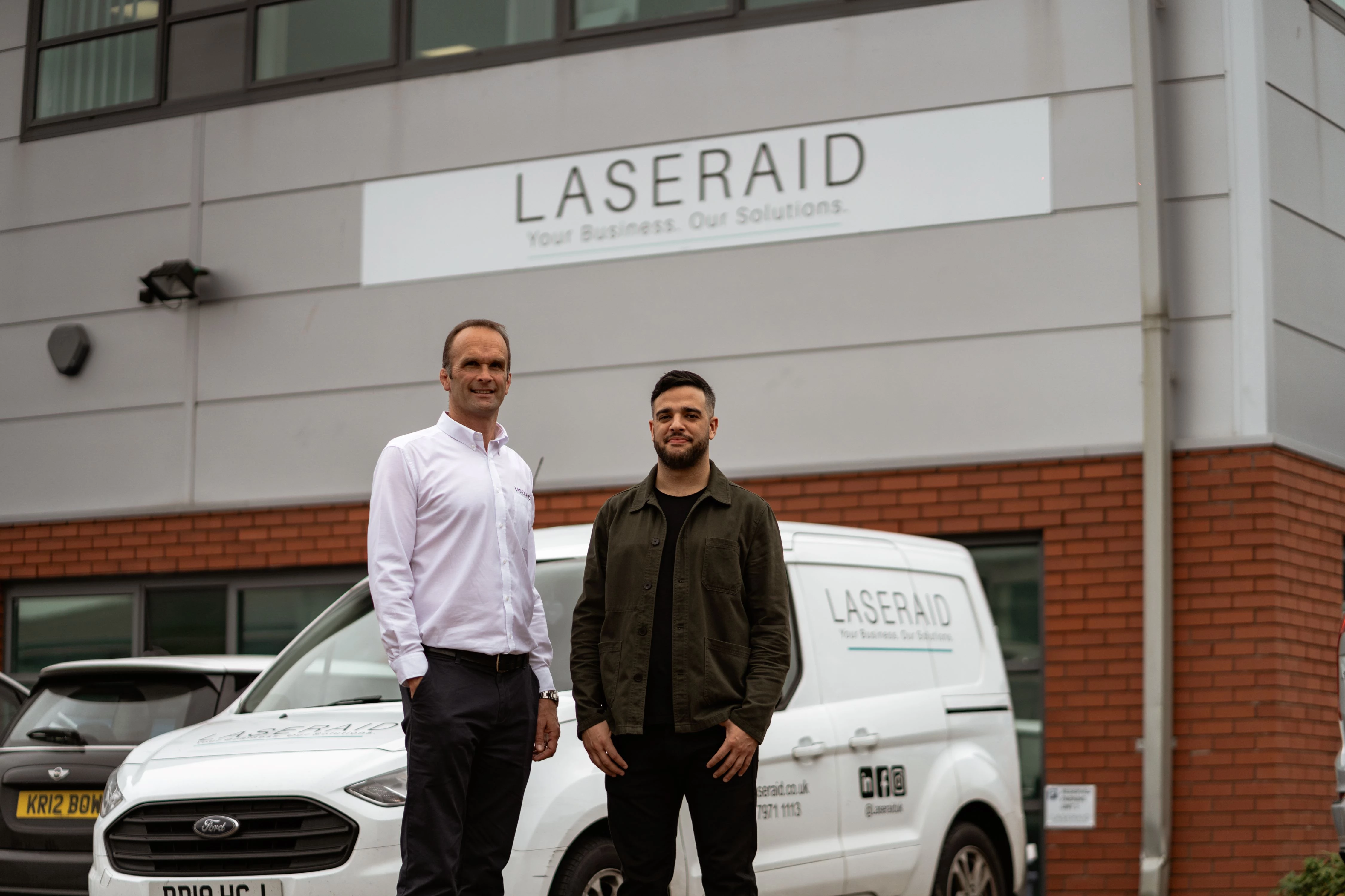 Tom Acland (left) and Jamel Hussain outside the new showroom, training academy and service centre