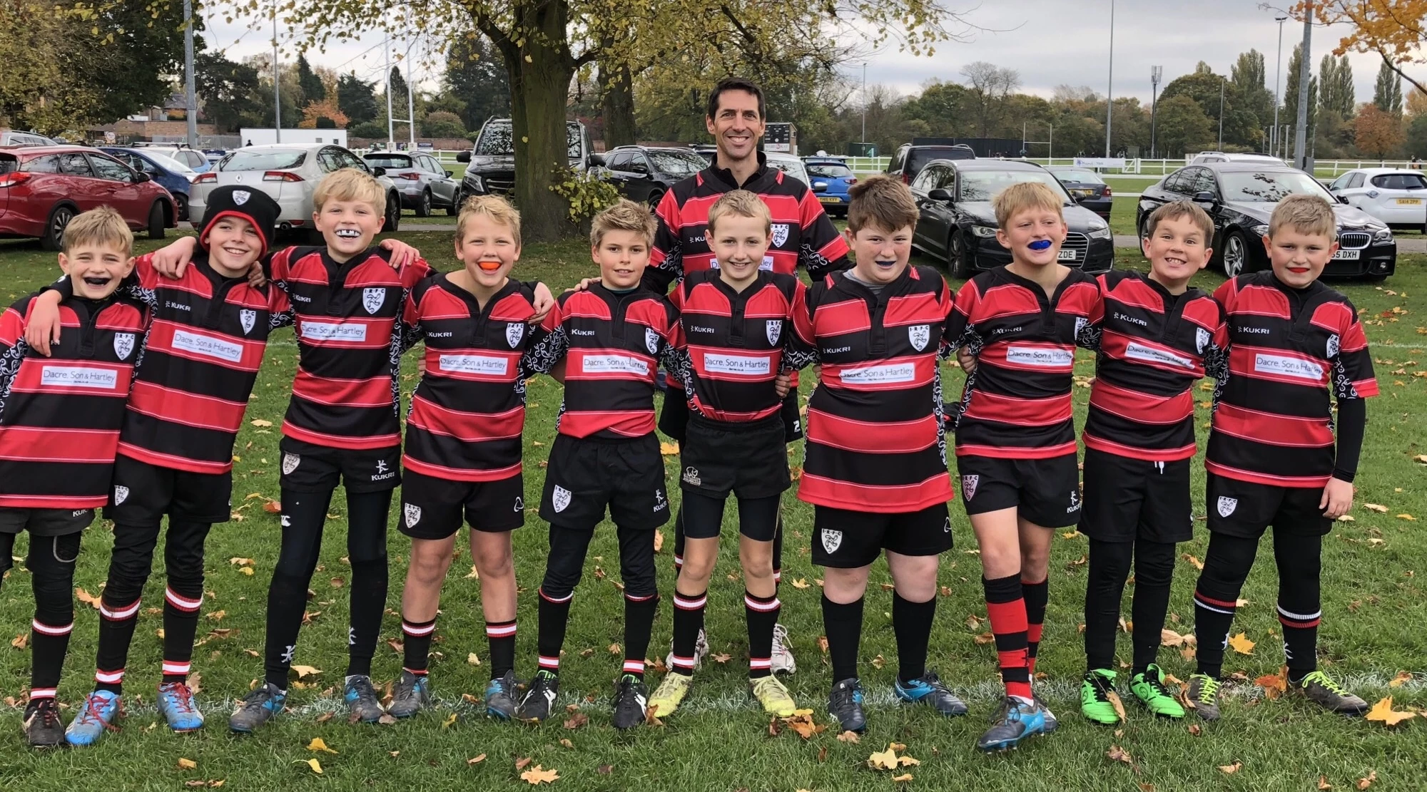 Ilkley Rugby Club coach Jon Hughes and the Under 11 team