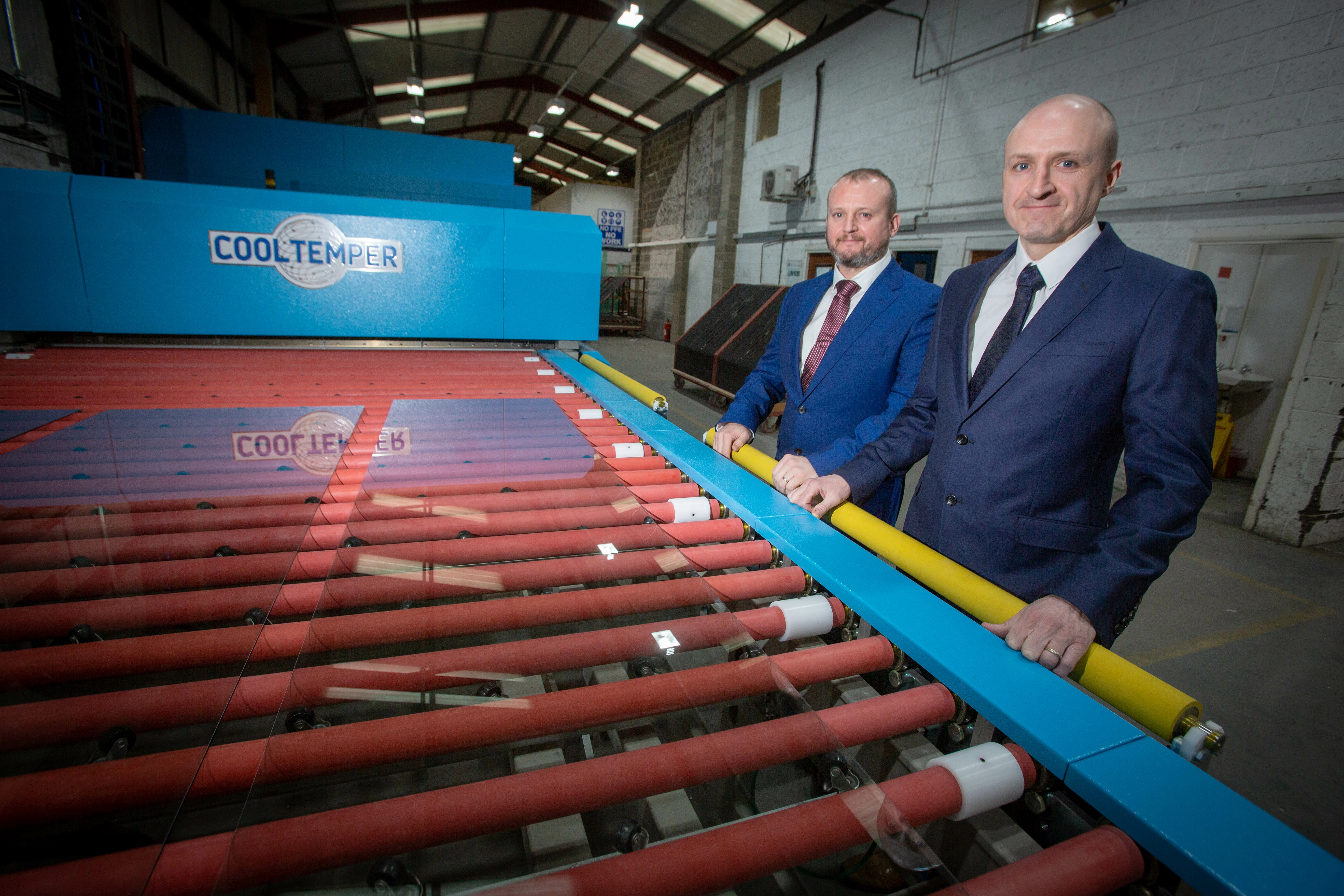 Andrew and Darren Donnelly with Donwood's new glass-toughening machine