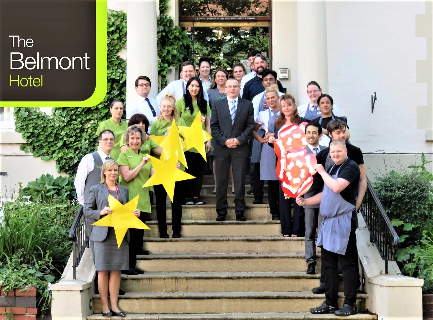 The Belmont Hotel, Leicester team celebrate a double award win with general manager Eloic Montagnier (centre)