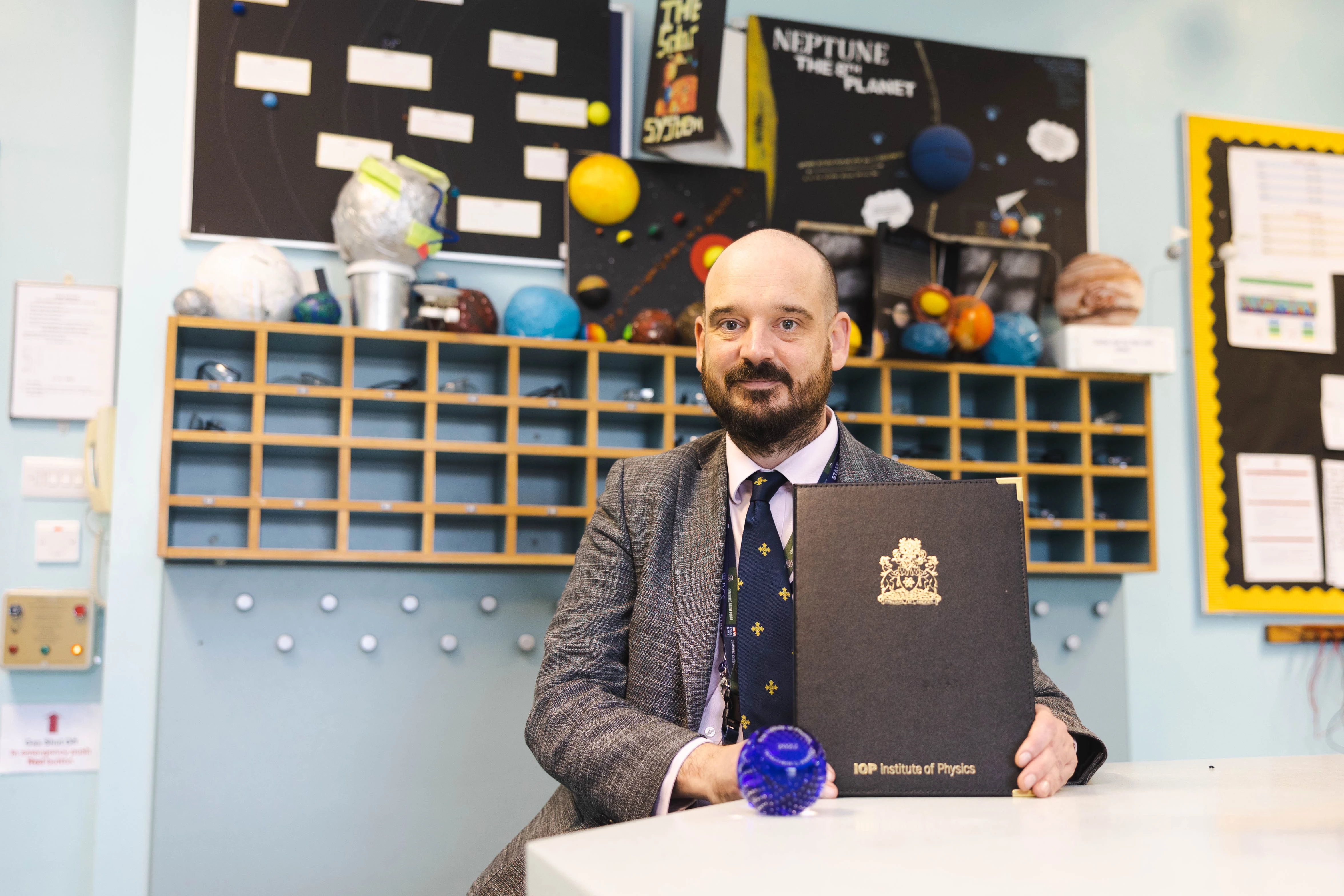 Tom Williams from the Royal Grammar School (RGS) in Newcastle with his award from the Institute of Physics.