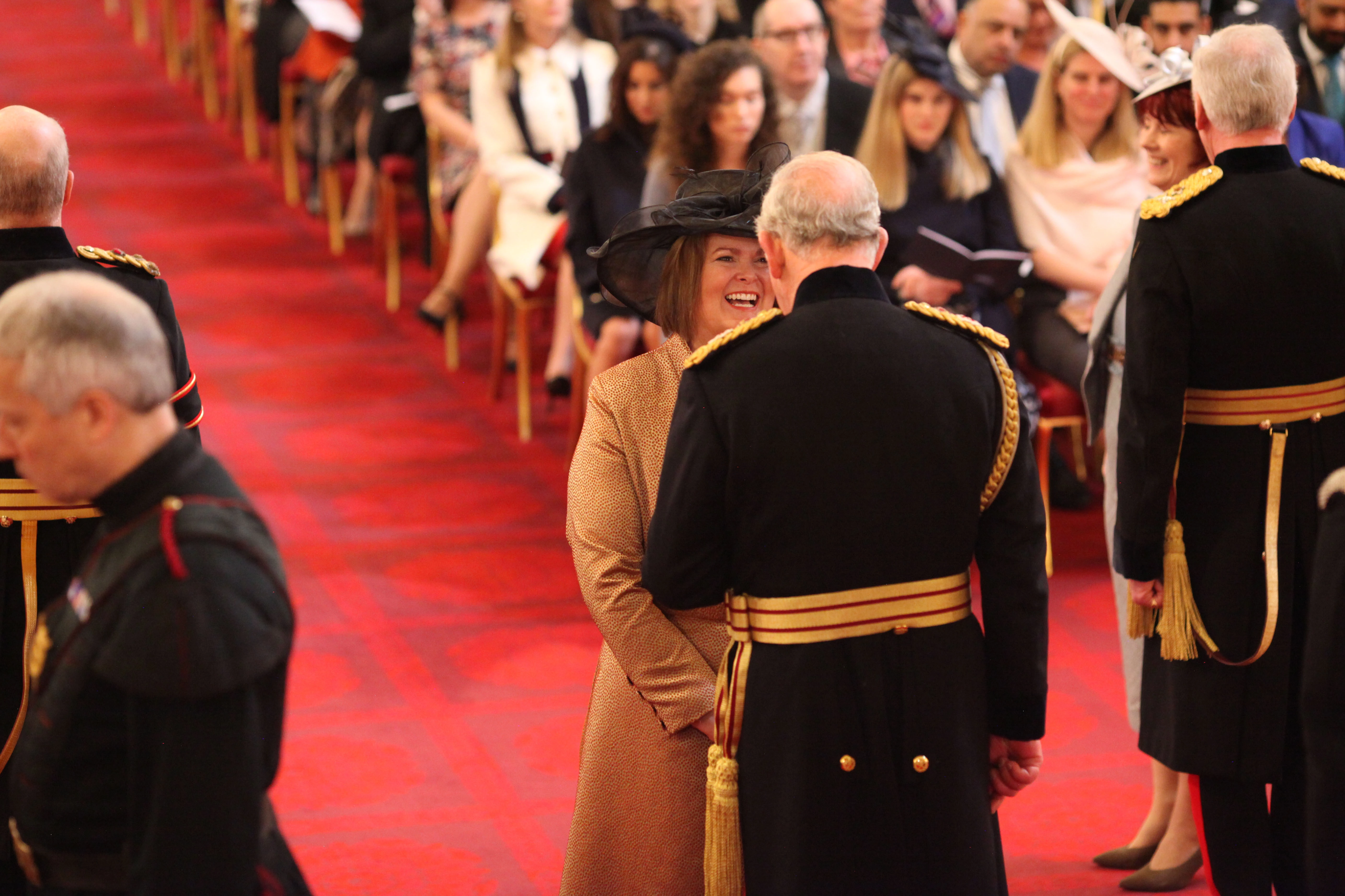Blackpool and The Fylde College Principal and Chief Executive Bev Robinson receiving her OBE from the Prince of Wales