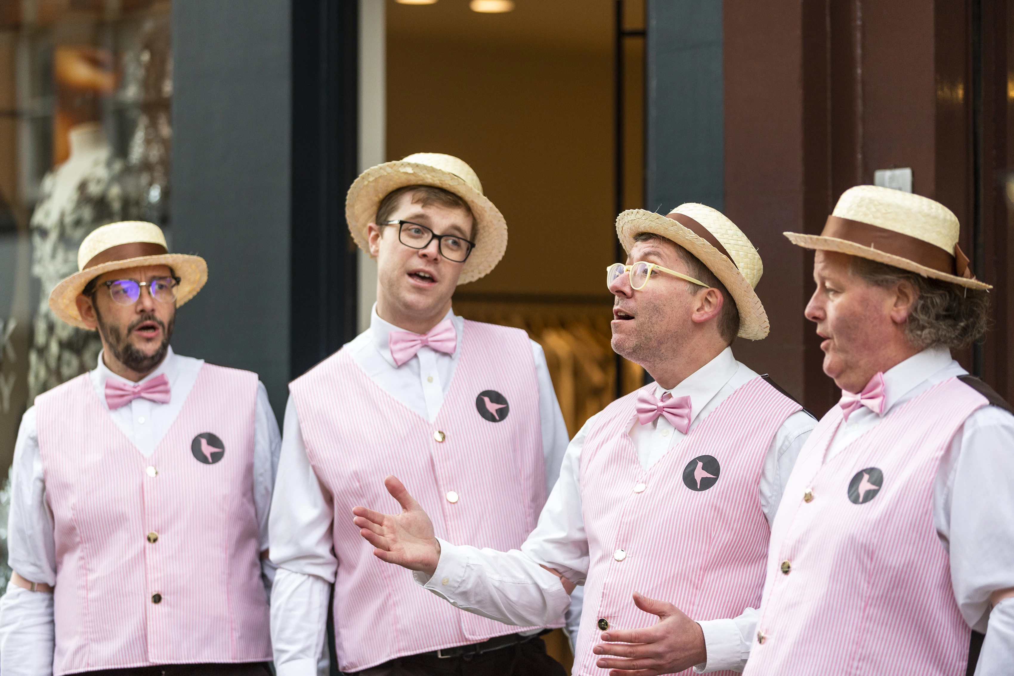 The Bakershop Quartet performs outside one of the Hummingbird Bakery's venues.