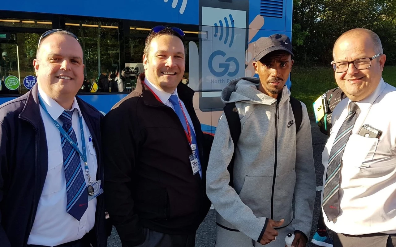 Team GNE members with a focussed Sir Mo Farah ahead of the Great North Run