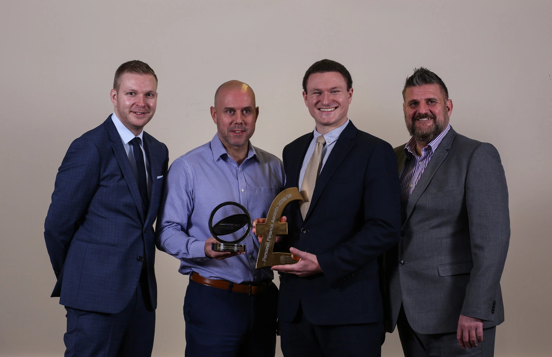 Mortgage adviser Matthew Grayson and IFAs Chris Donnelly, Robert Little and Martin Cockerill with the North East Advisor Firm of the Year and Robert’s Investment Advice Specialist of the Year awards