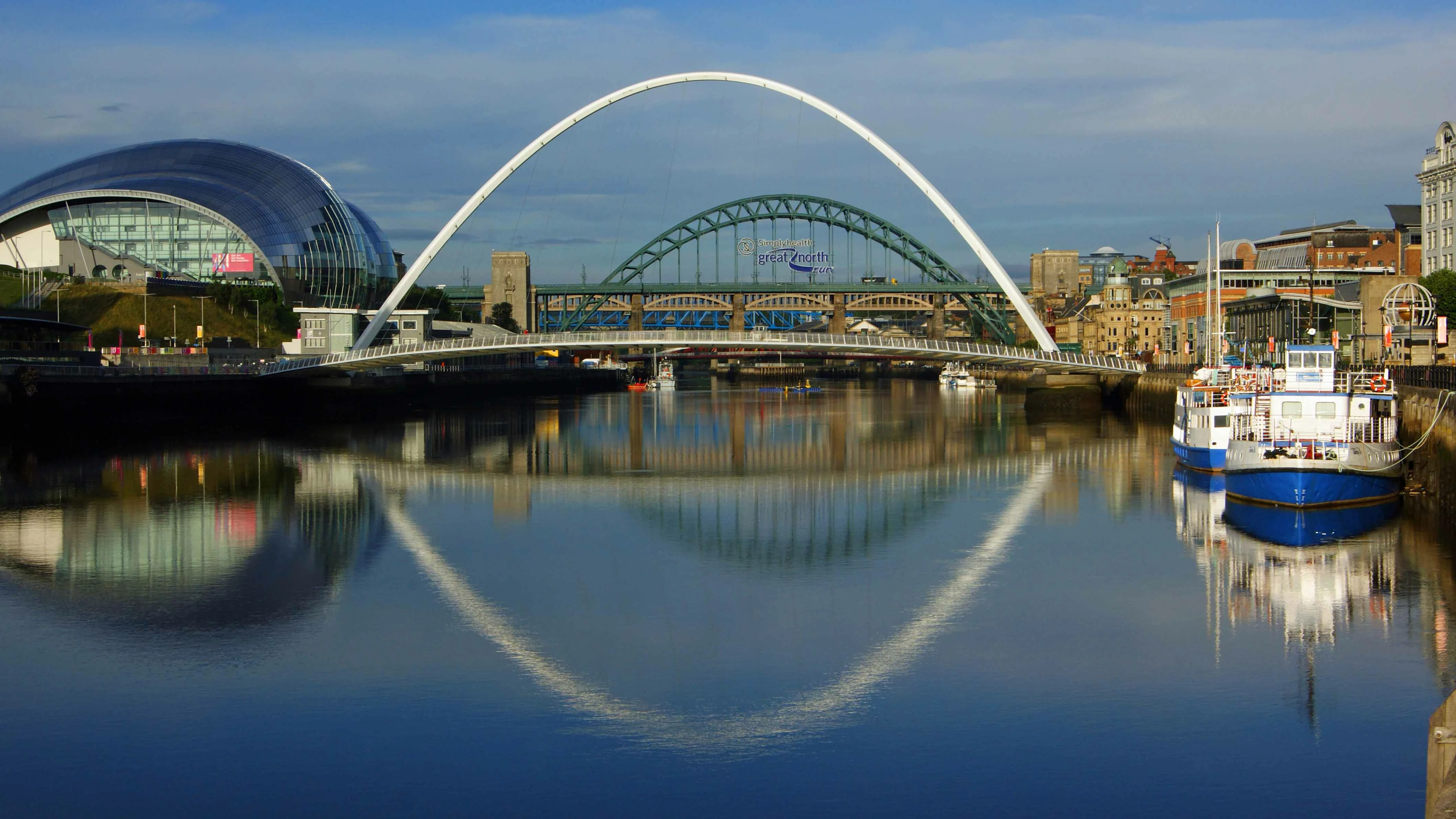 Newcastle upon Tyne Quayside panorama, on a reflective sunny morning