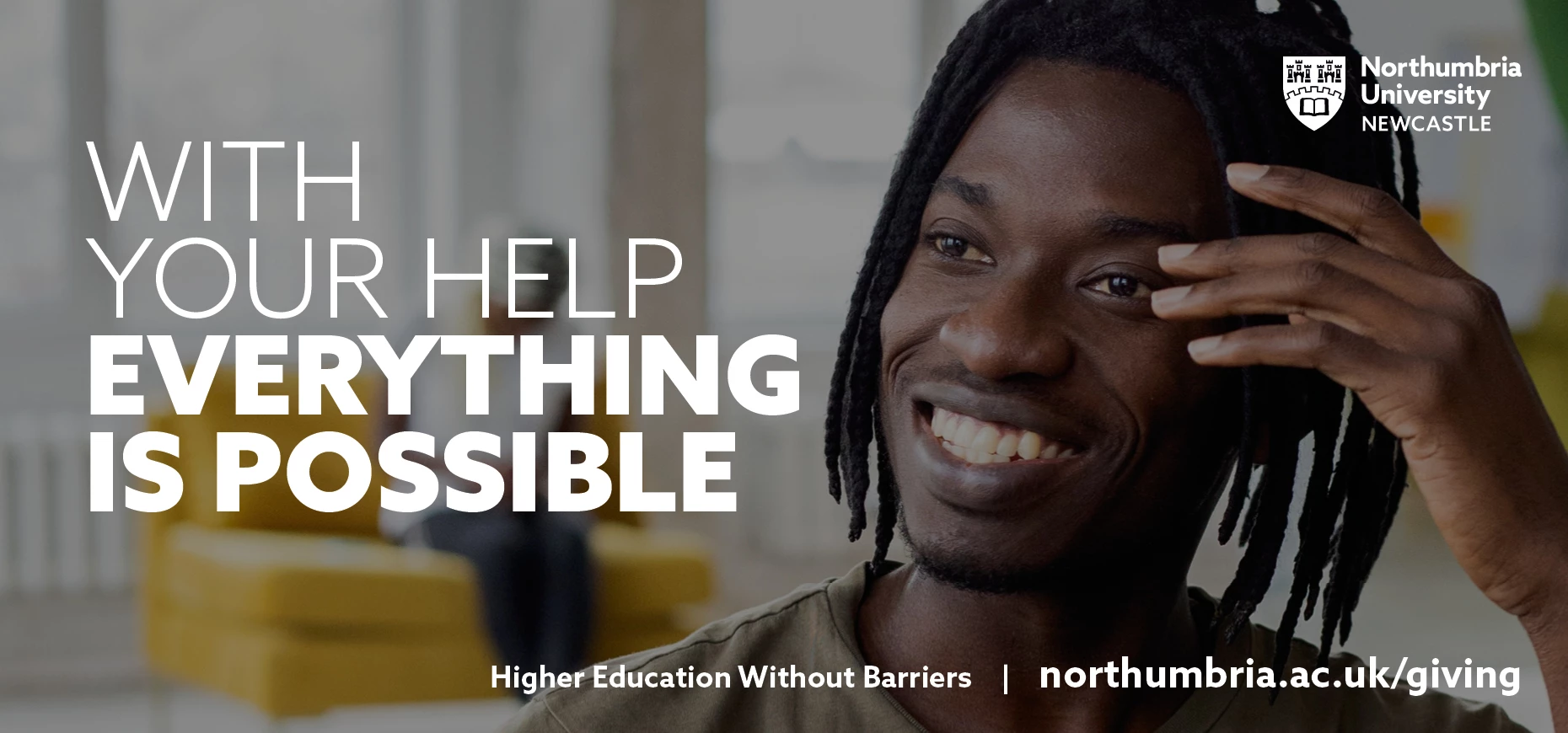 Smiling man looking towards tagline; with your help everything is possible
