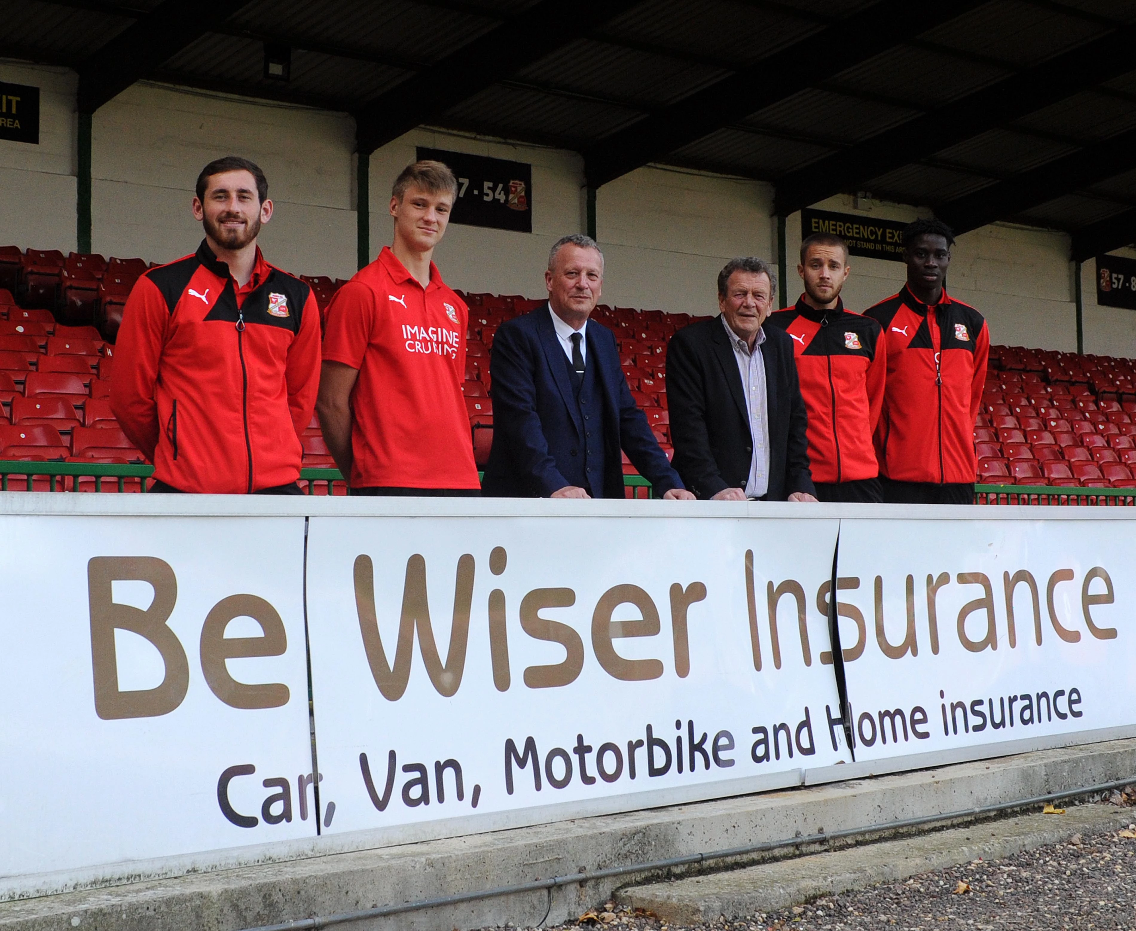 Pictured – Swindon FC players Jak McCourt, Joe Romanski, Olly Lancashire, and Elijah Adebayo.