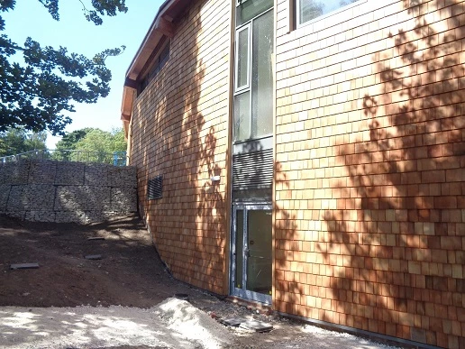 The cedar shingle cladding installed by Martin-Brooks at Sherwood Forest Visitor Centre. 