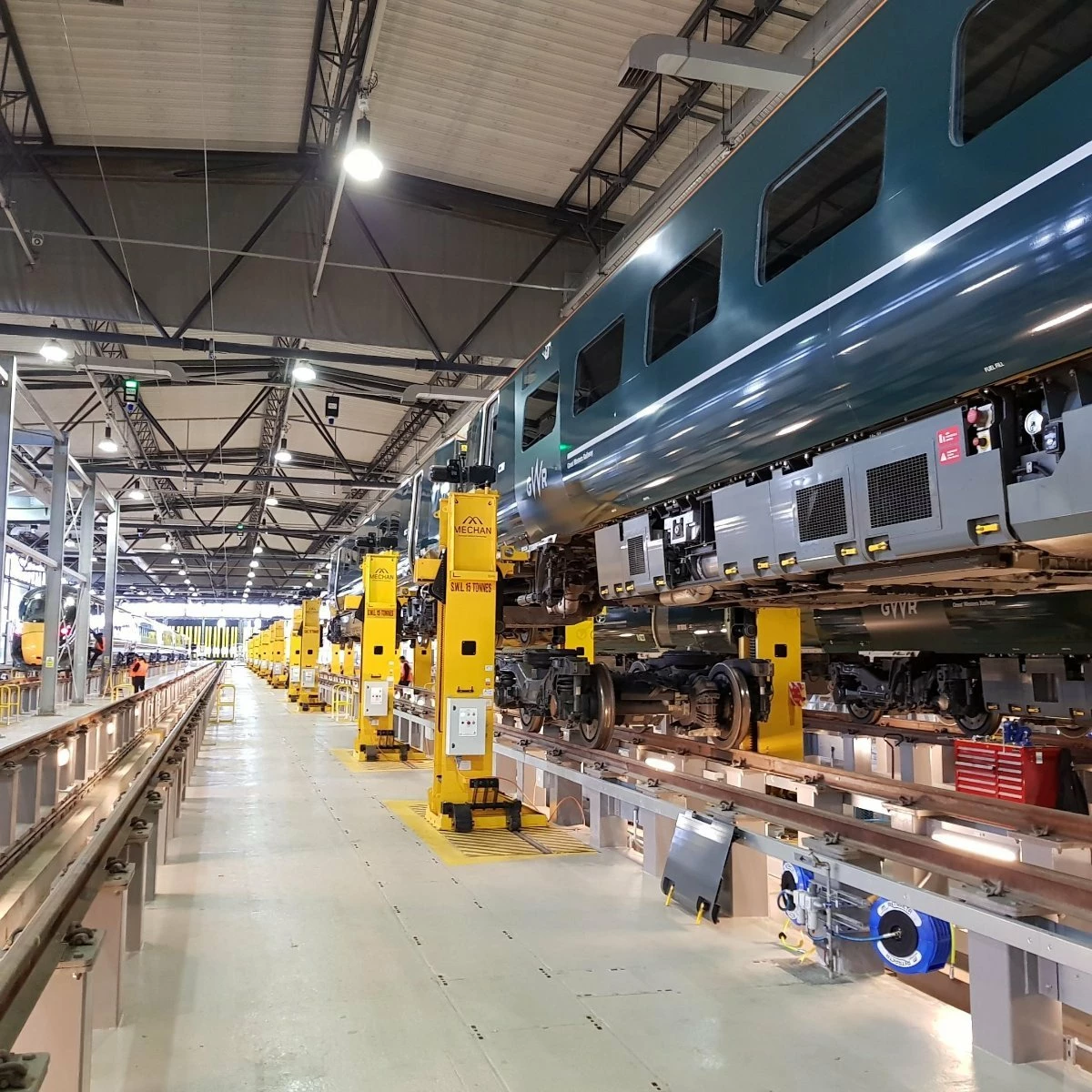 Mechan's jacks in use at Hitachi Rail's Doncaster maintenance facility. 