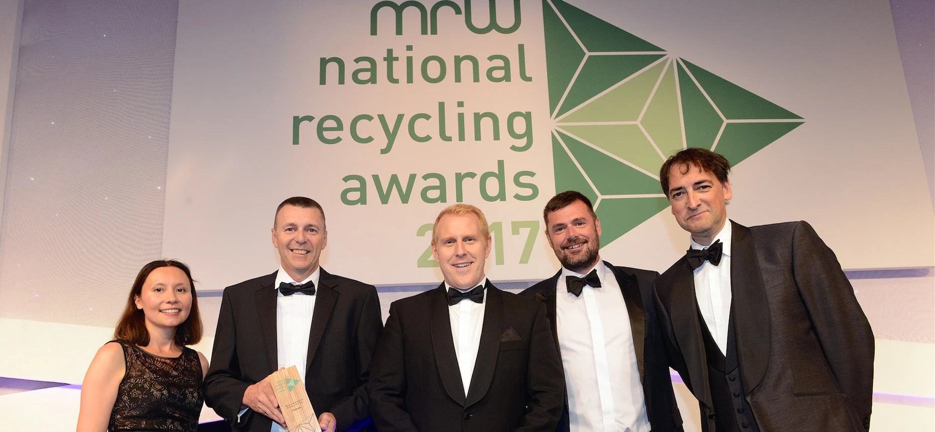 Timberpak winners are presented with their trophy. Left to right: Associate Editor of MRW, Andrea Lockerbie; Director Timberpak Limited, Mark Hayton; Customer Relationship Manager Timberpak Limited, Gavin Ball, Andy Berridge, Director Timberpak South East