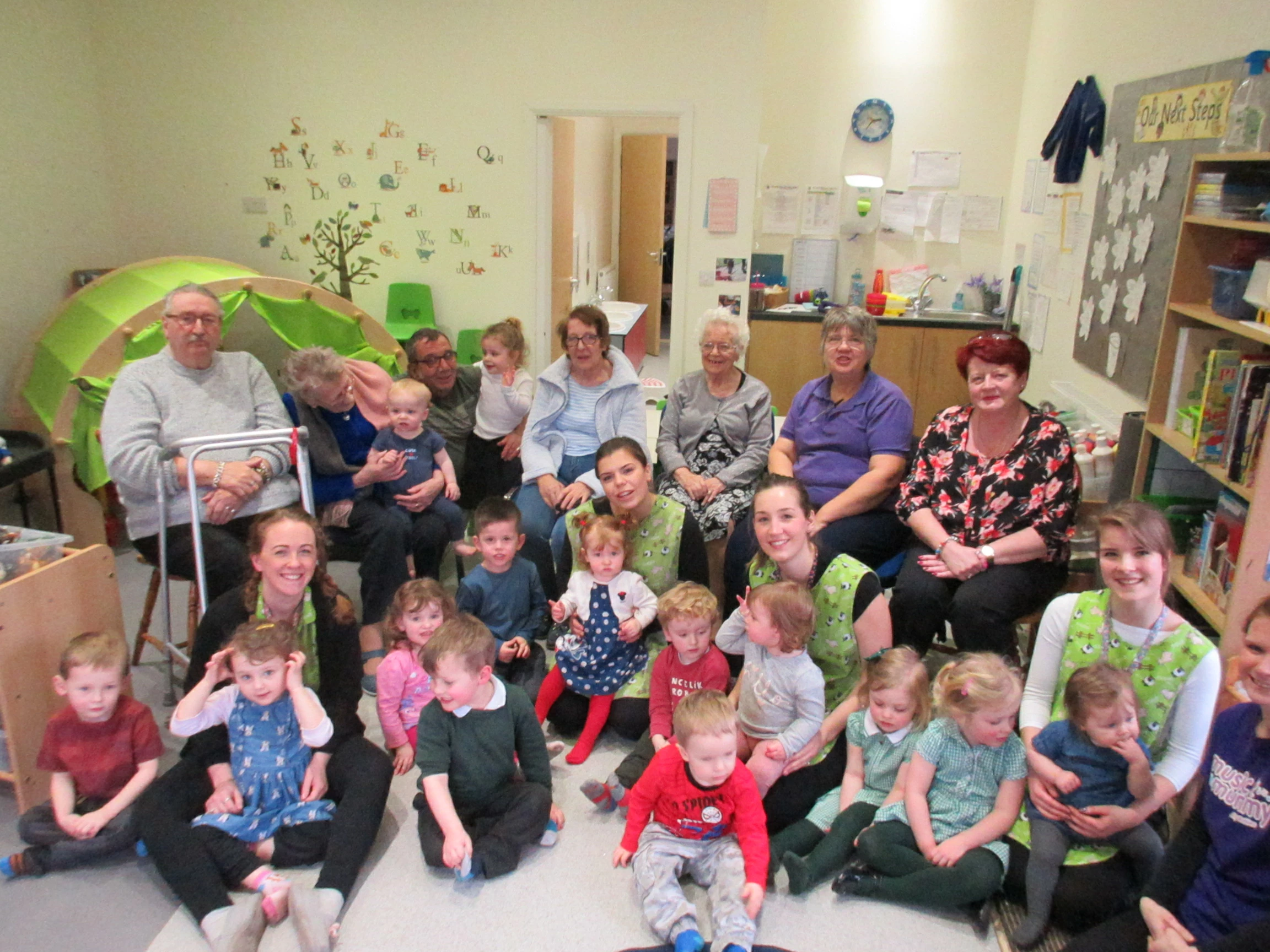 Tamarix Lodge residents visiting children at School House nursery 