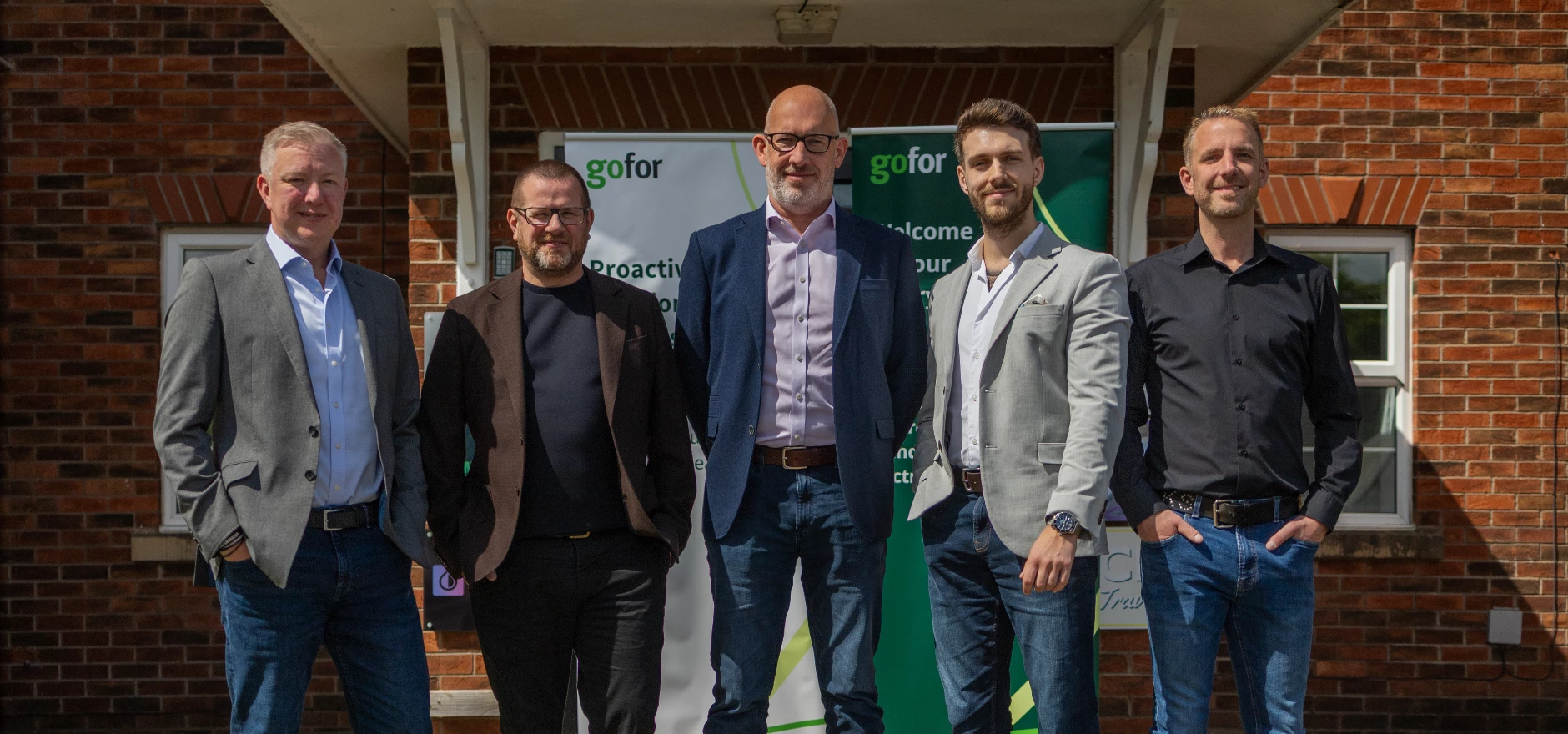 Peter Wright, Graham Lesslie (CEO), Iain Bennett (MD), Mark Stuart and Paul Armstrong outside gofor's new office in Blackburn.jpg