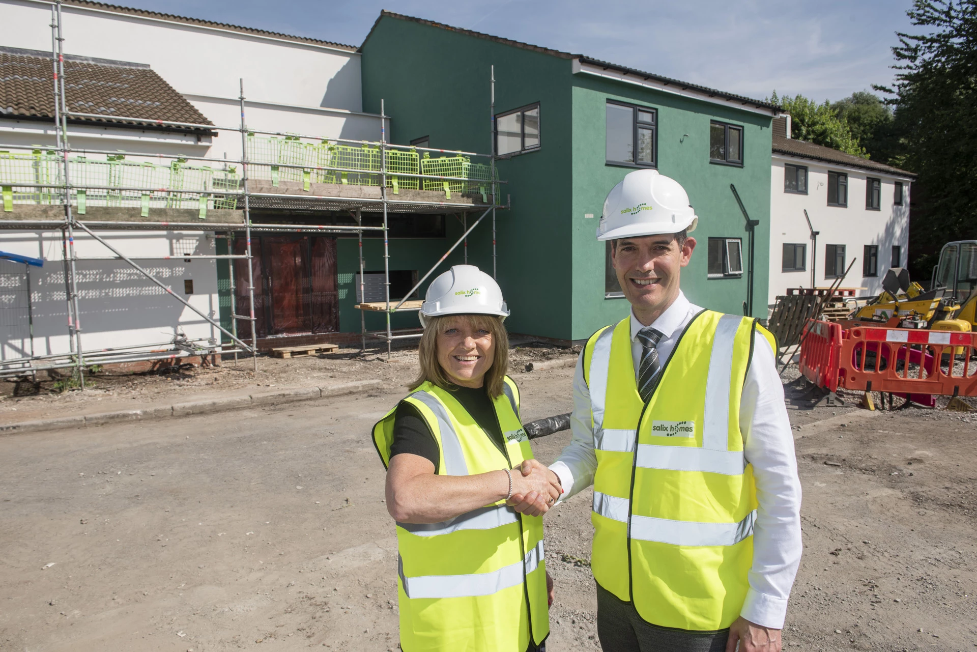 Sue Sutton, executive director of operations at Salix Homes, with Ian Moston, group chief finance officer for Salford Royal, at the Alexander Gardens development.