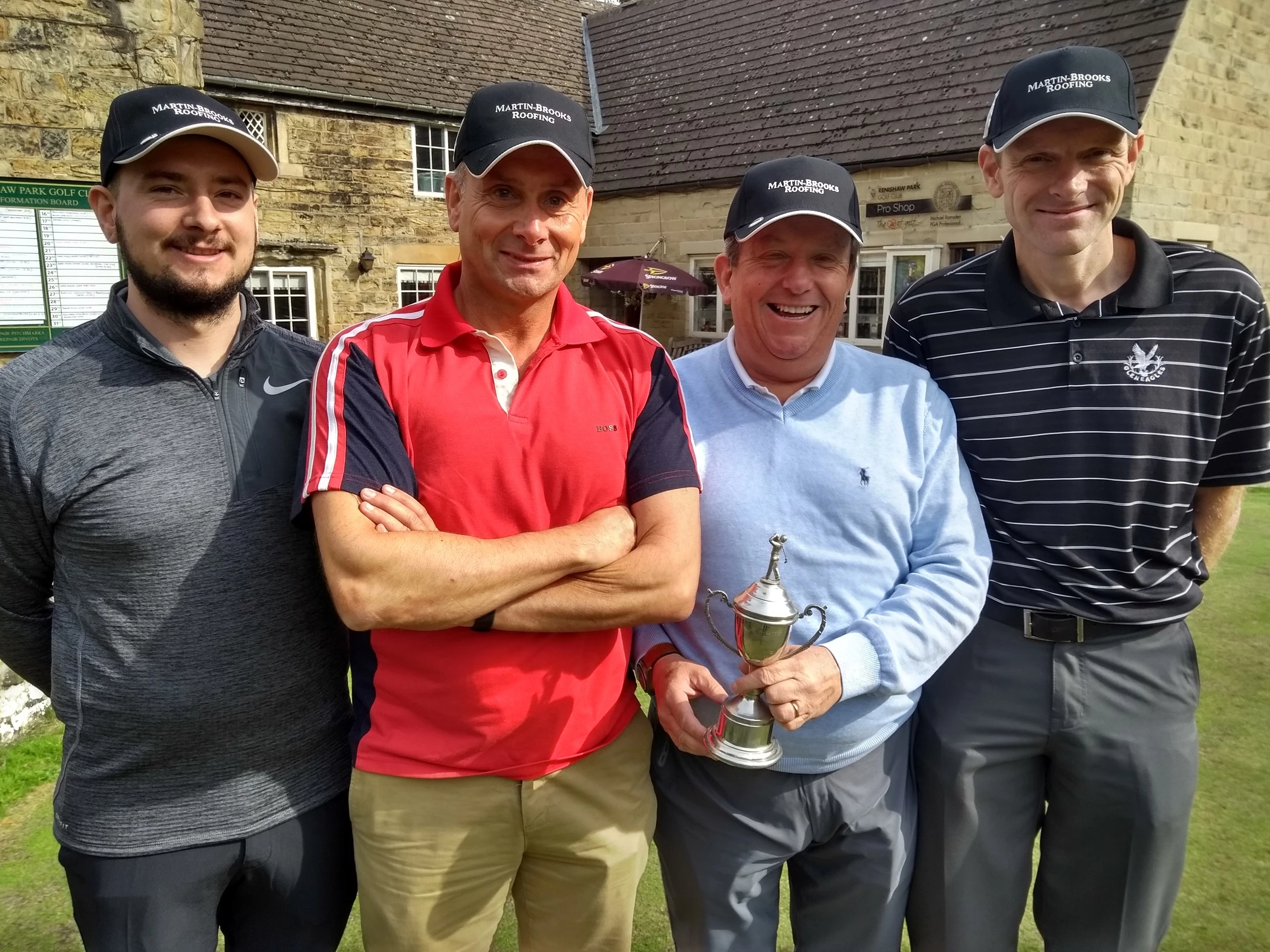 Dale Wright (second left) with his Martin-Brooks colleagues at last year's charity golf day. 