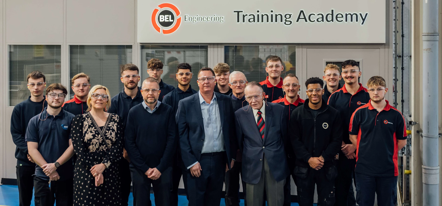 British Engines group apprentices with senior members of the team.jpg