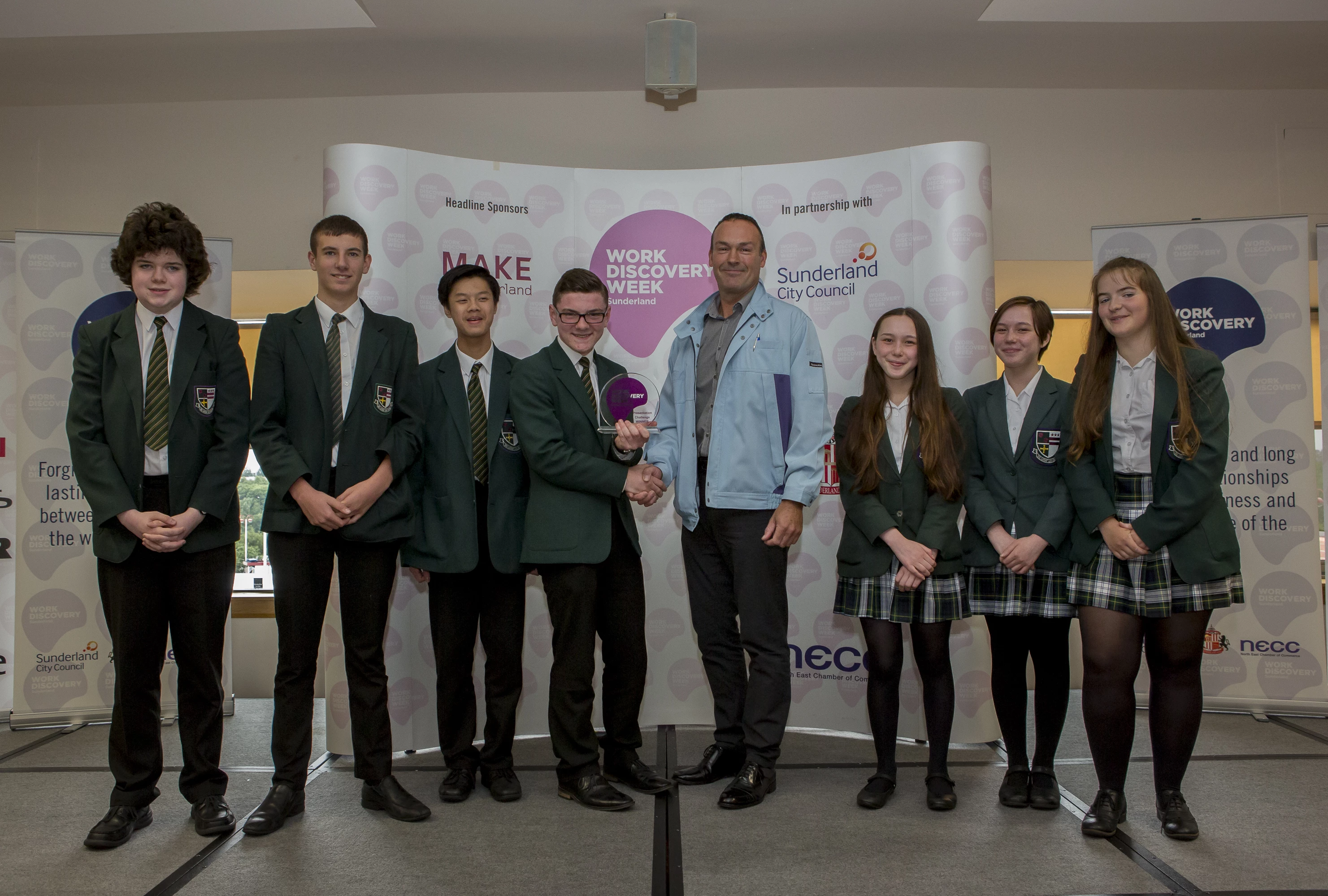 Pictured is John Whitfield of day sponsor, Calsonic Kansei with the winning team from St Robert of Newminster School.