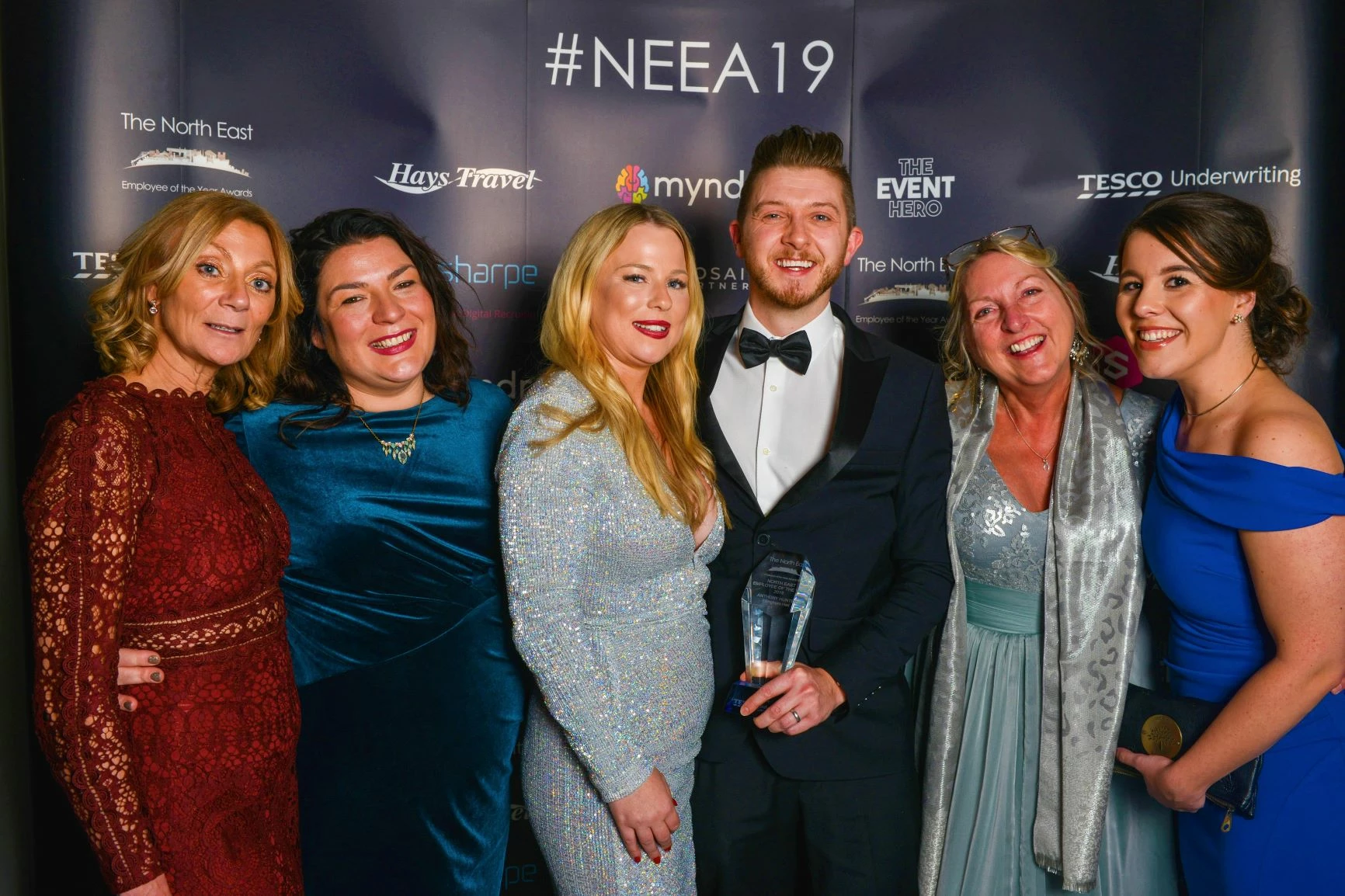 Anthony Hunter - General Manager at Ellingham Hall celebrates with colleages after being named North East Employee of the Year 2019
