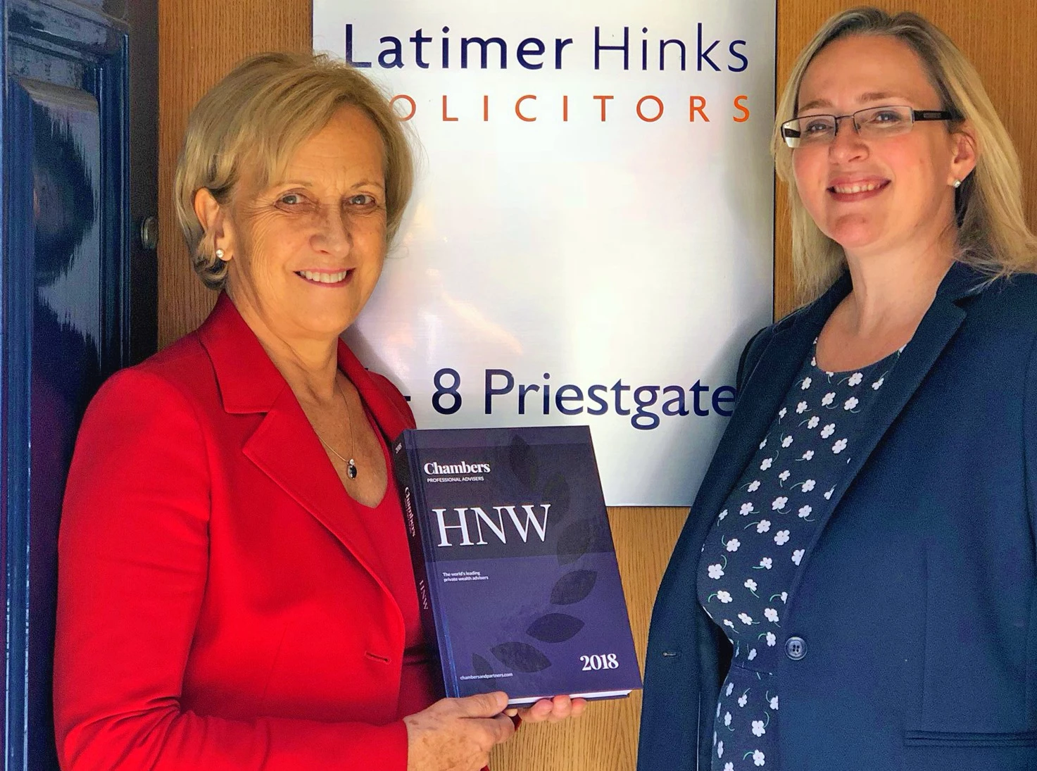 (L to R) Anne Elliott and Elizabeth Armstrong with a copy of the 2018 guide