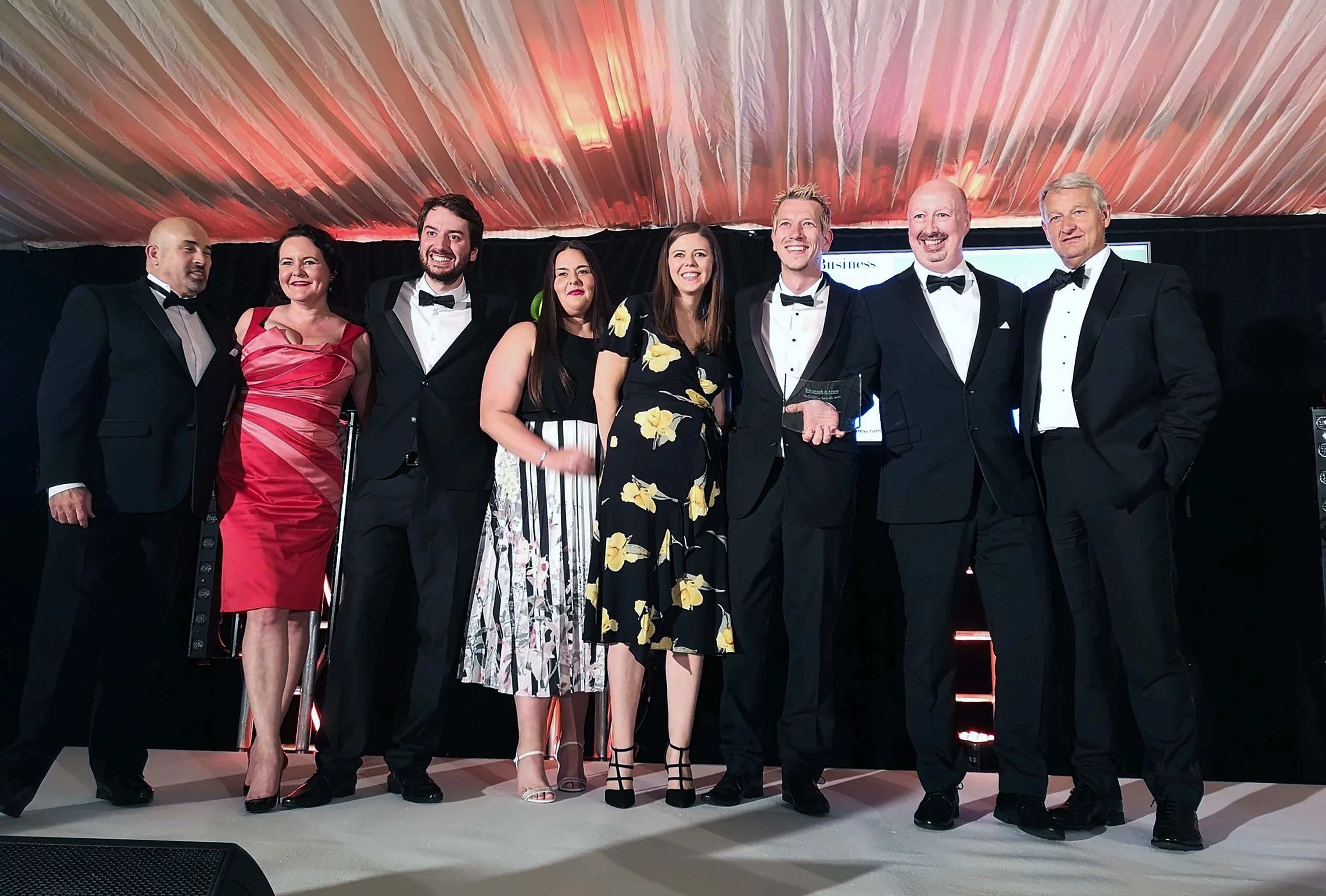 EXA Networks' team on stage after scooping second award